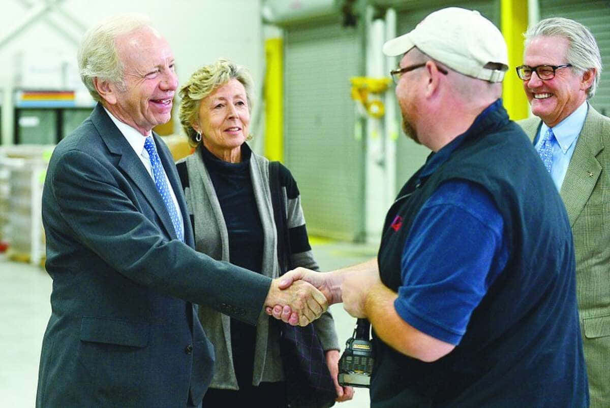 Joseph Lieberman, warehouse, shaking hands, SD Desktop Wallpaper
