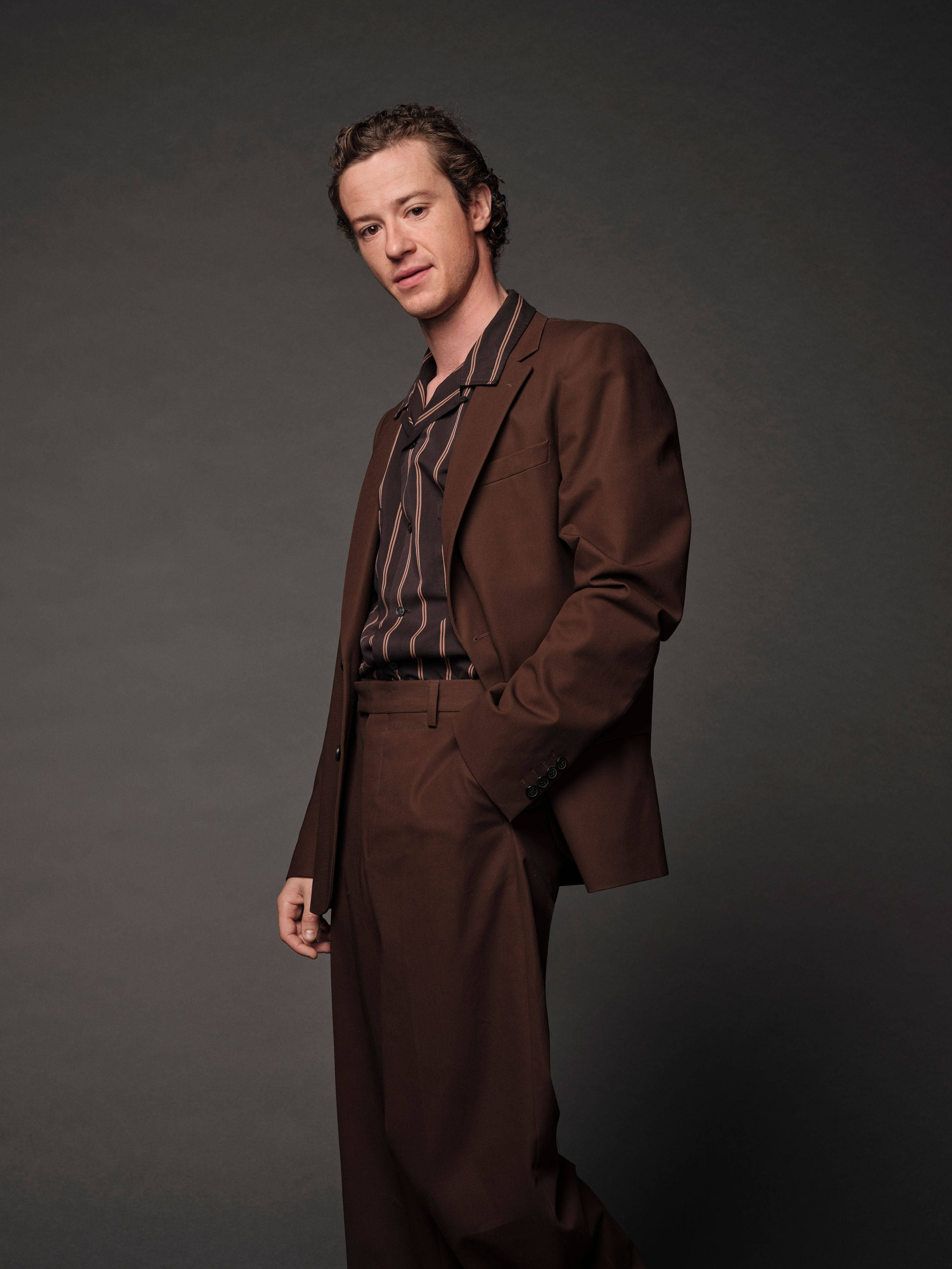 Joseph Quinn, brown suit, striped shirt, 4K Phone Wallpaper