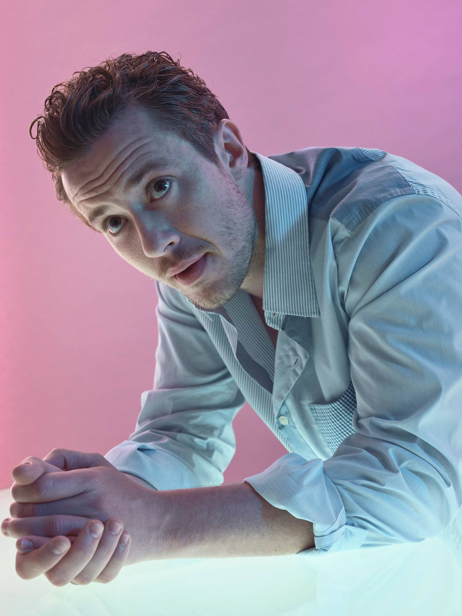 Joseph Quinn, light blue shirt, vibrant pink background, Full HD Phone Wallpaper