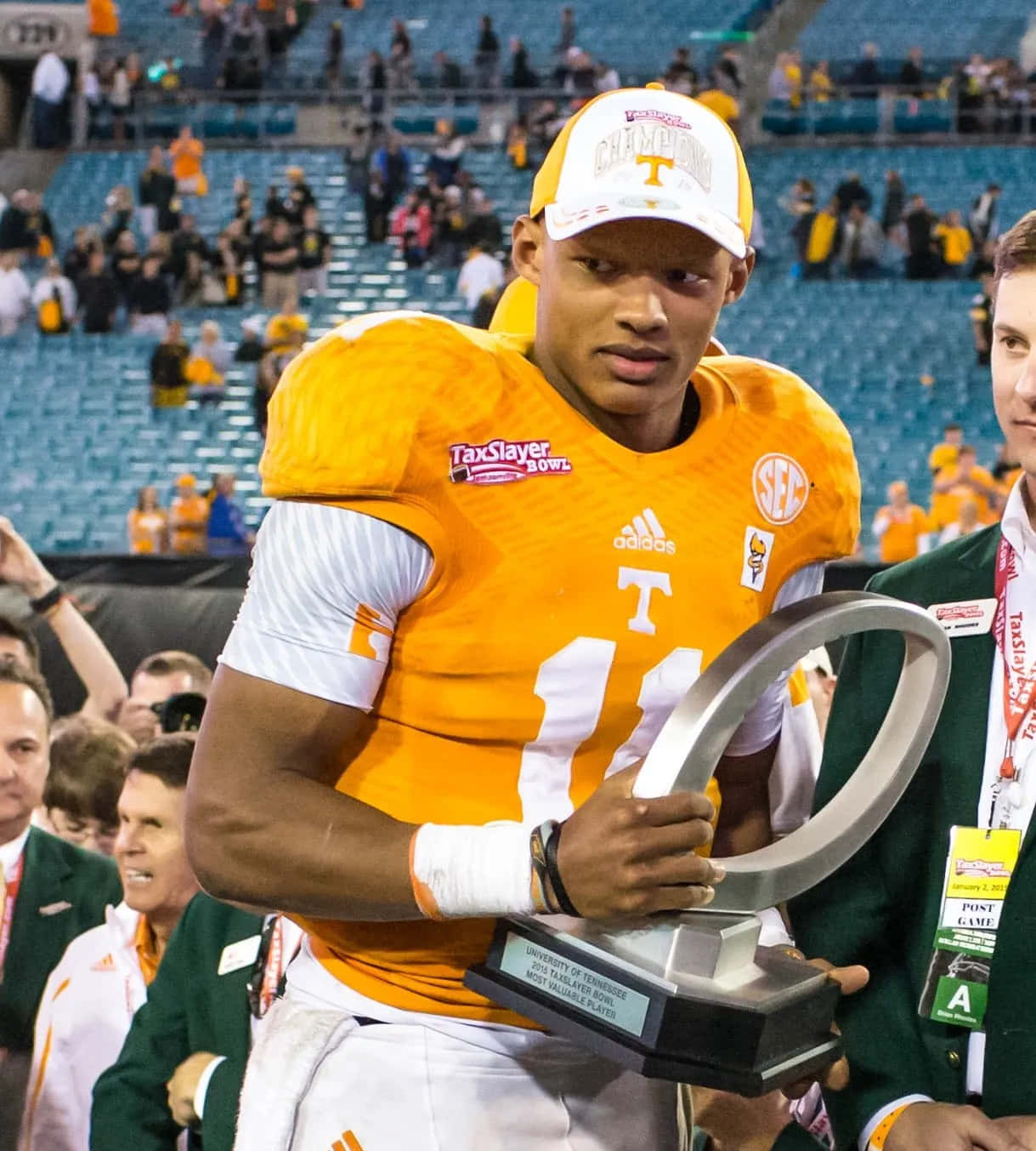 Joshua Dobbs, orange jersey number 11, silver ring trophy, HD Phone Wallpaper