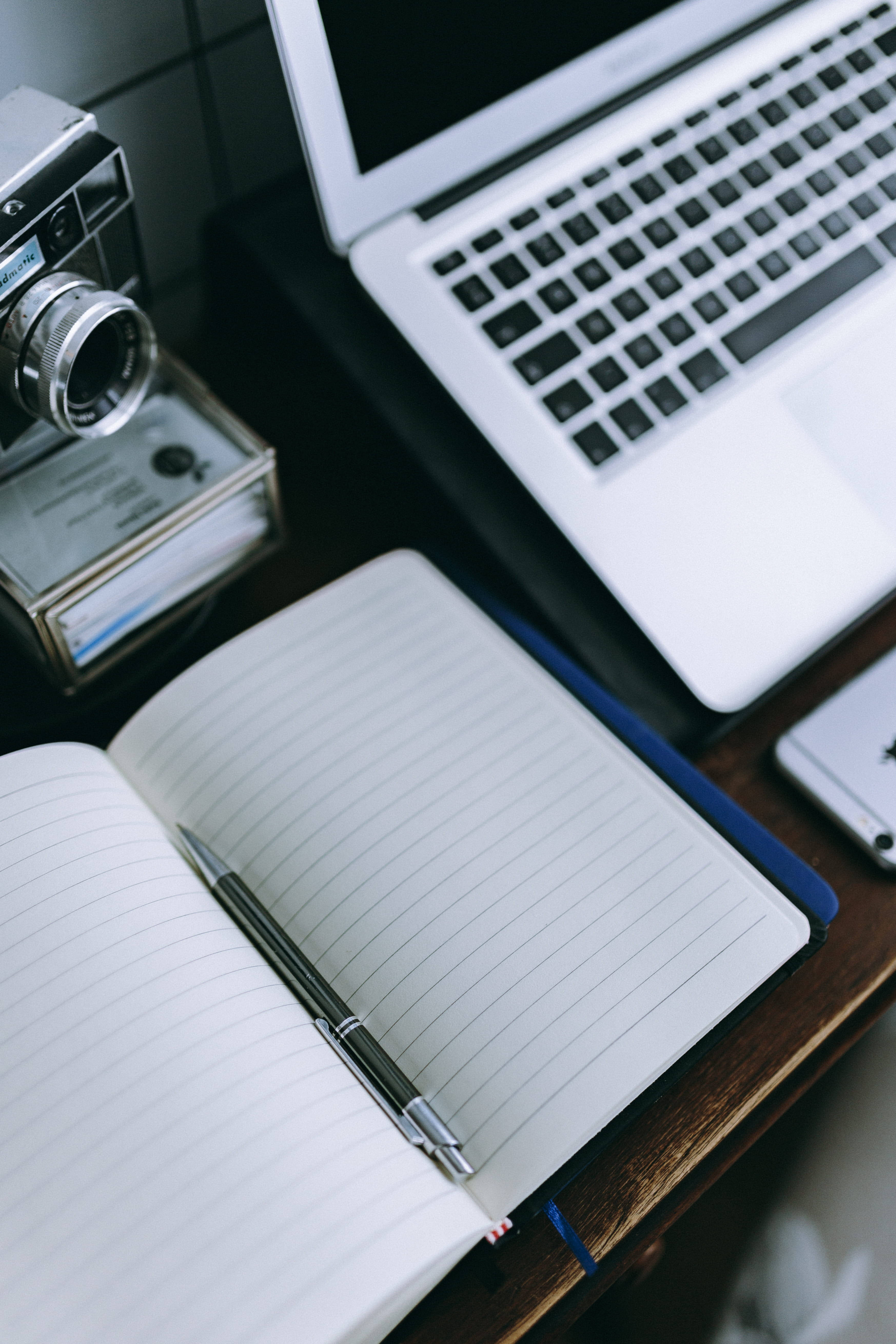 iPhone, wooden desk, lined notebook, 5K Phone Wallpaper