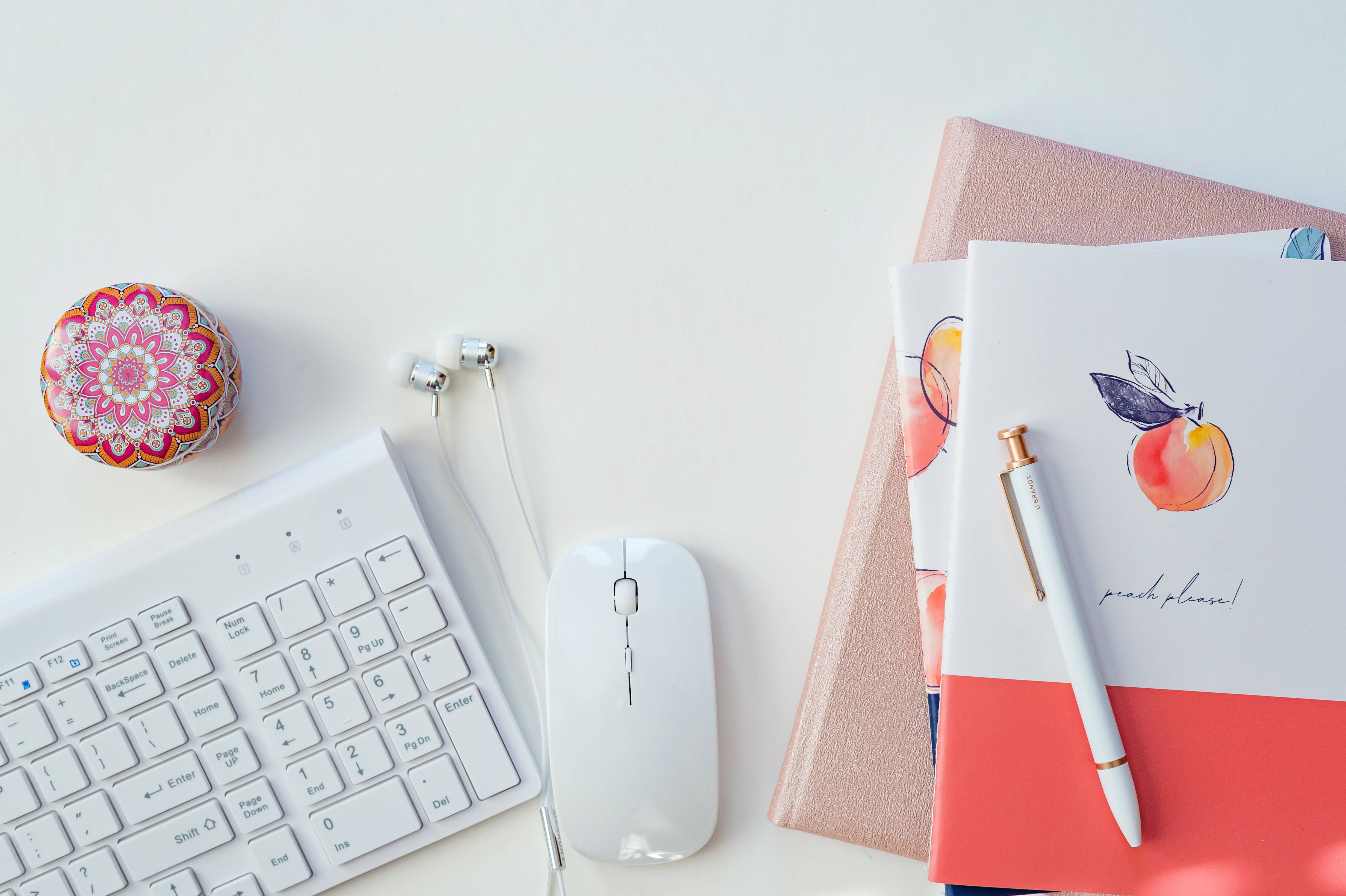 Journals, minimalist white desk, keyboard, 4K Desktop Wallpaper