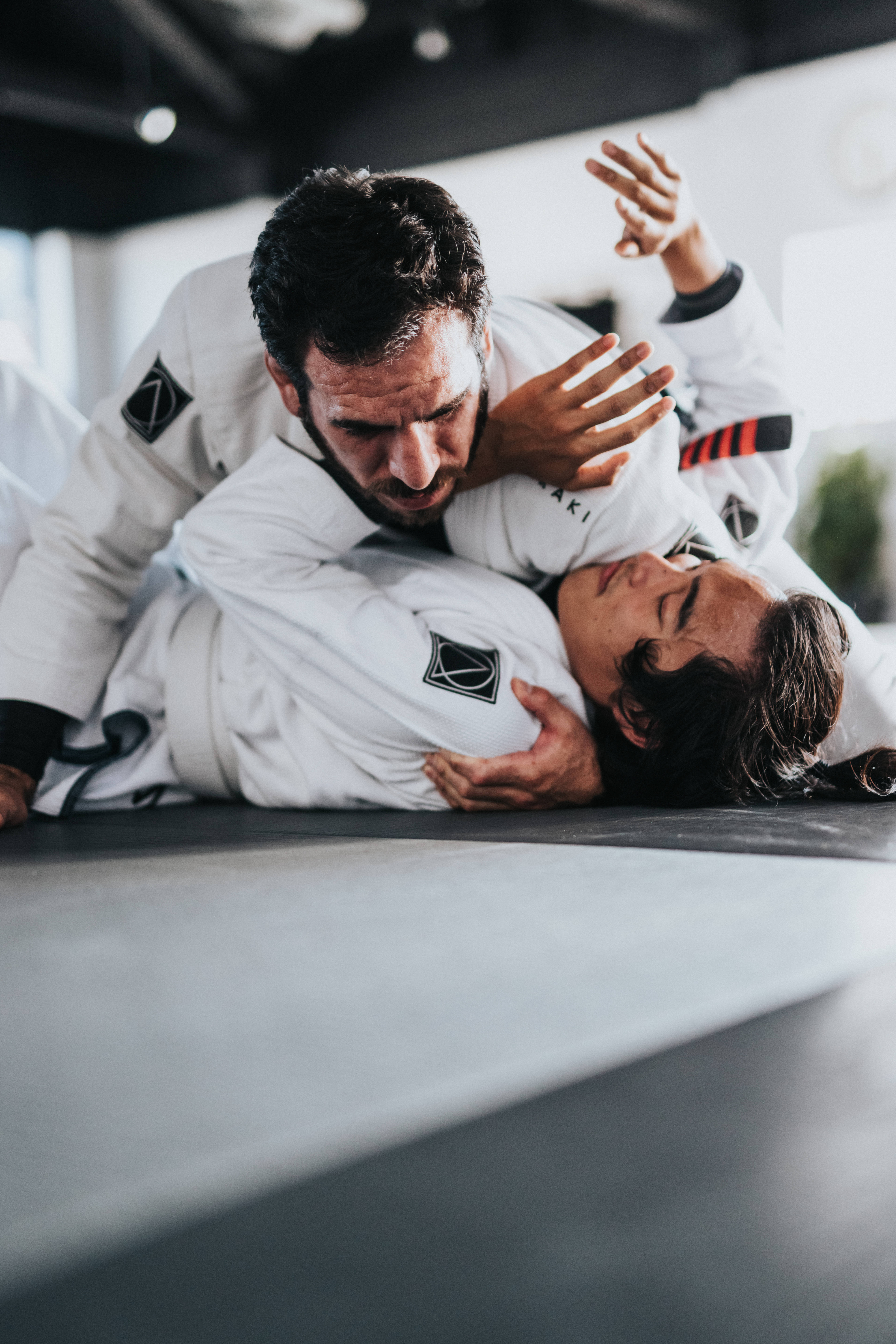 white gi uniforms, gray mat, bright gym, 8K Phone Wallpaper