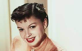 Judy Garland, dark curled hair, floral hairpin, SD Desktop Wallpaper