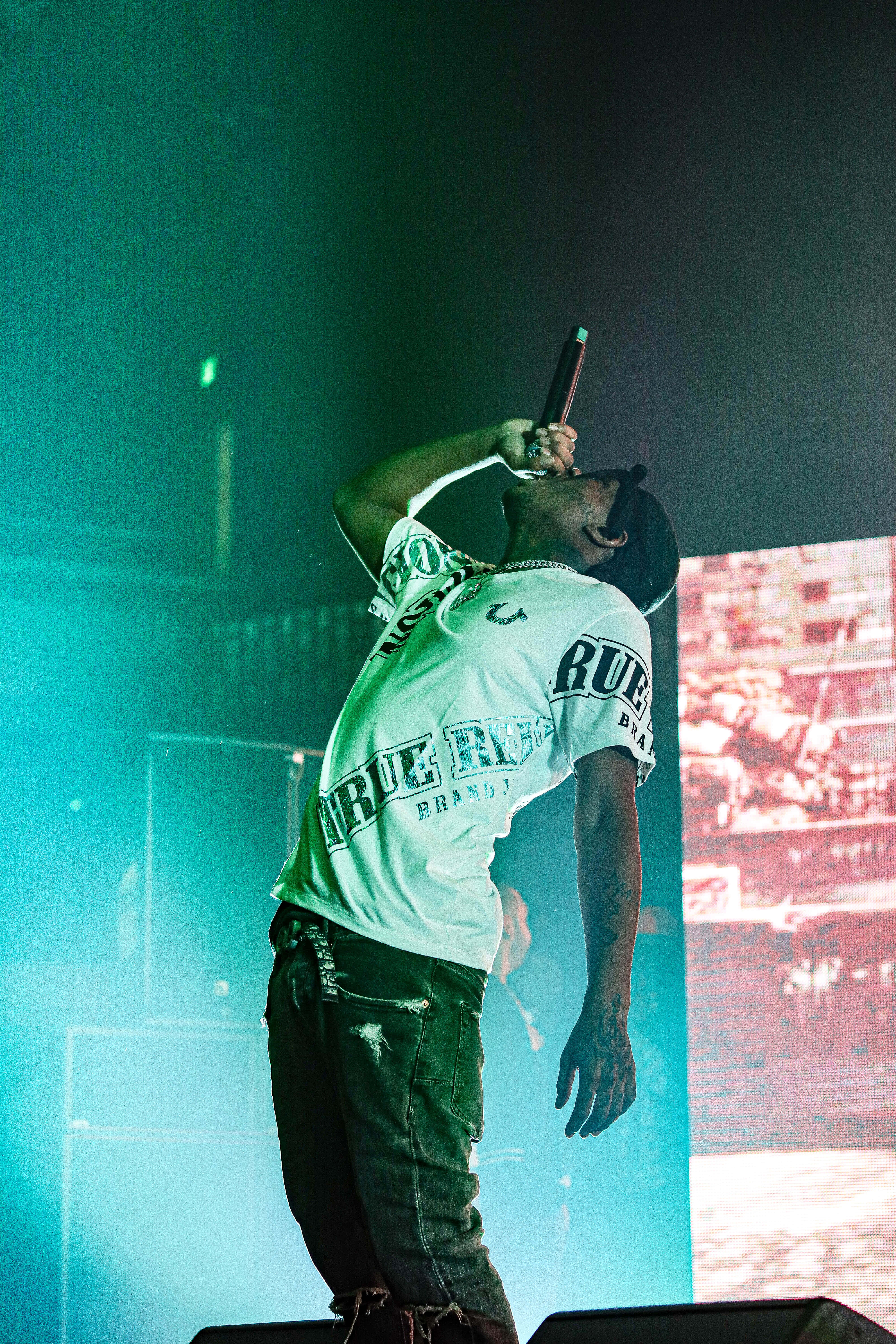 Juice Wrld Concert, vibrant green lights, red screen backdrop, 5K Phone Wallpaper