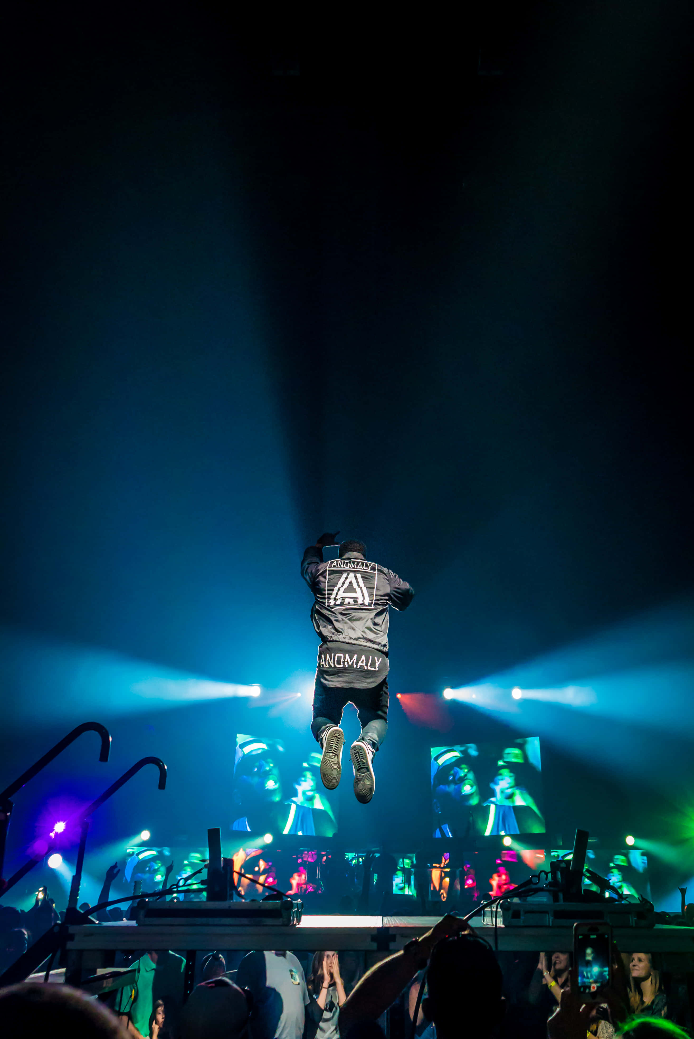 Juice Wrld, concert stage, vibrant blue and purple spotlights, 4K Phone Wallpaper