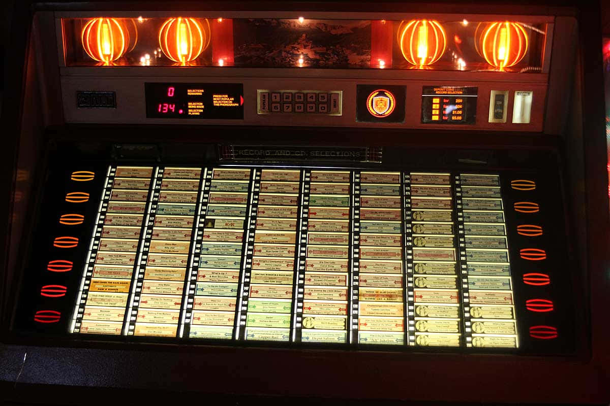vintage jukebox, amber lights, illuminated record sleeves, SD Desktop Wallpaper