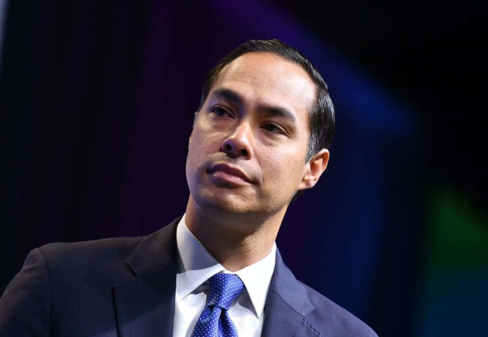 Julian Castro, dark suit, blue tie, SD Desktop Wallpaper