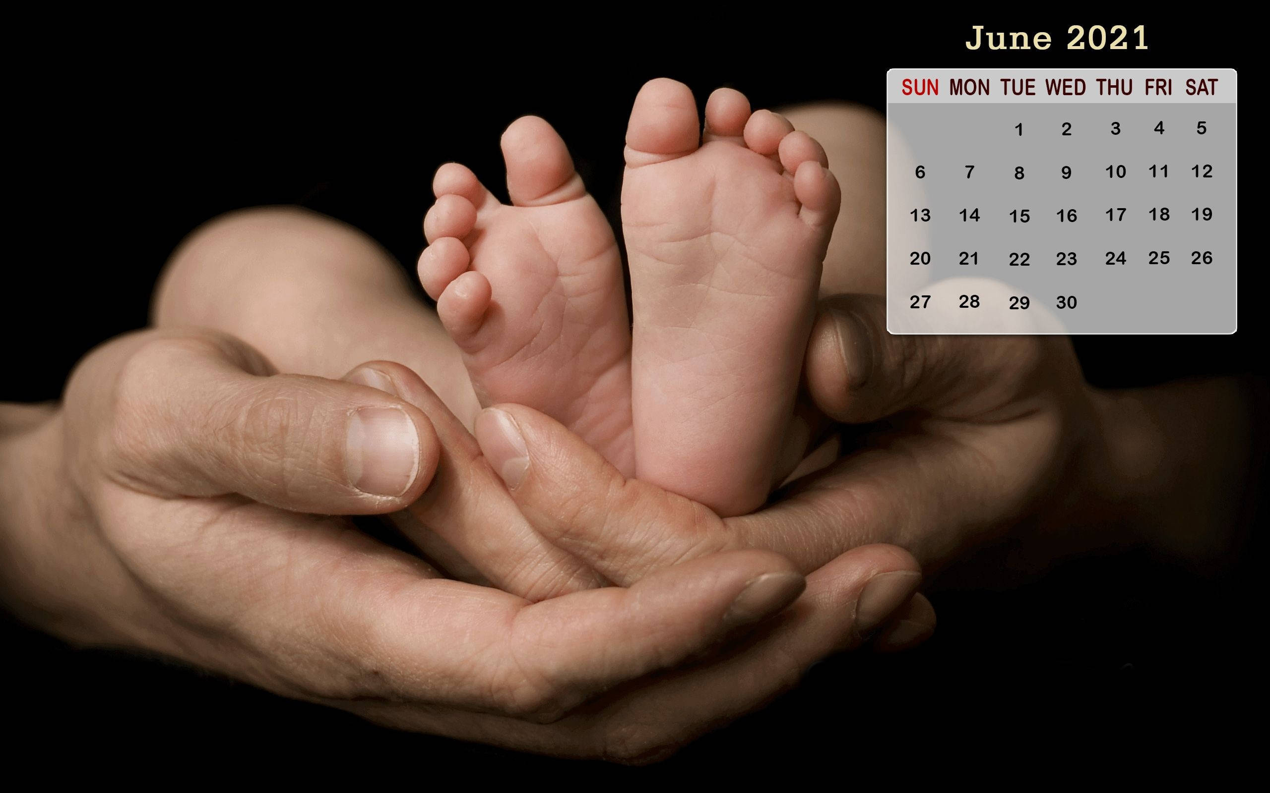 June 2021 Calendar, black background, adult hands, 2K Desktop Wallpaper