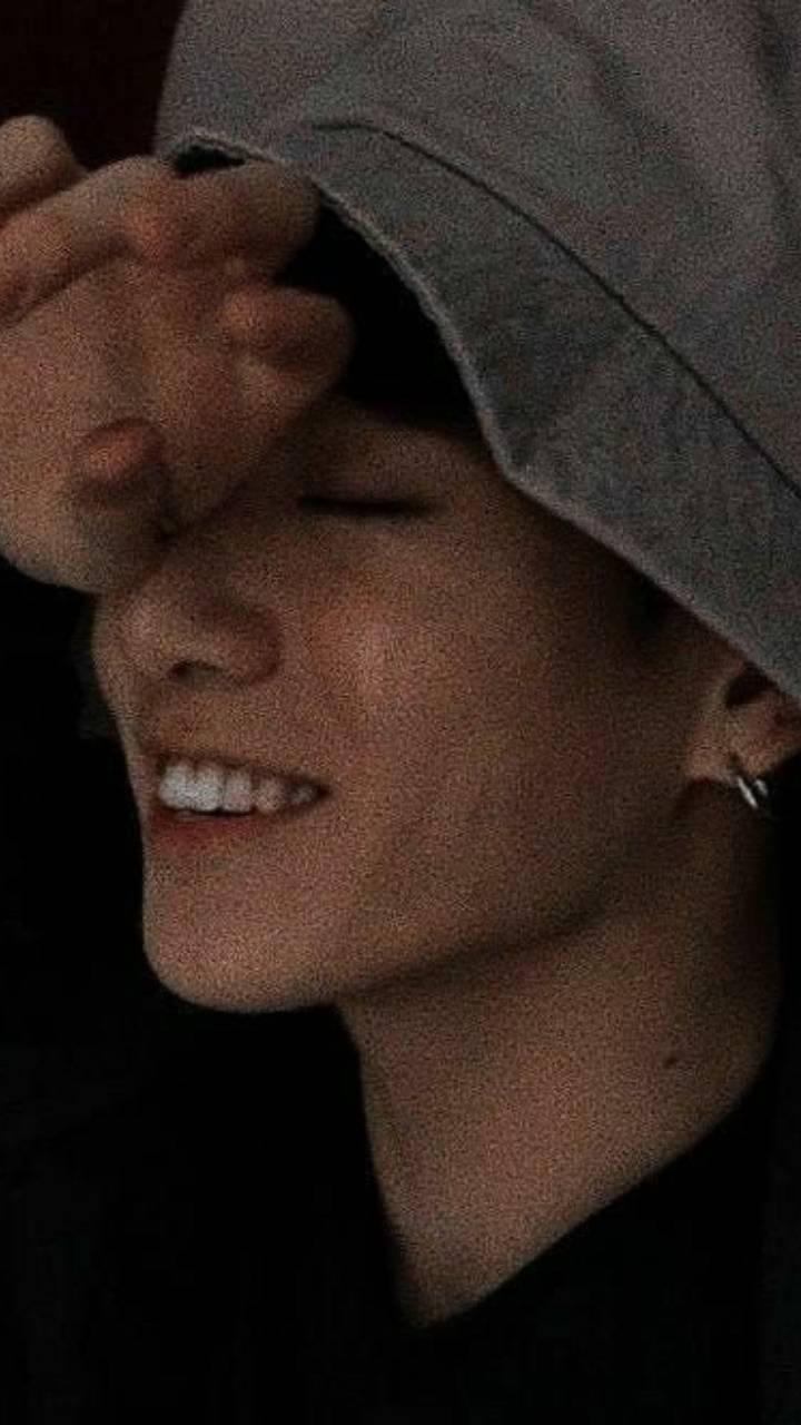 Shy Jungkook Aesthetic, gray bucket hat, smiles warmly, HD Phone Wallpaper
