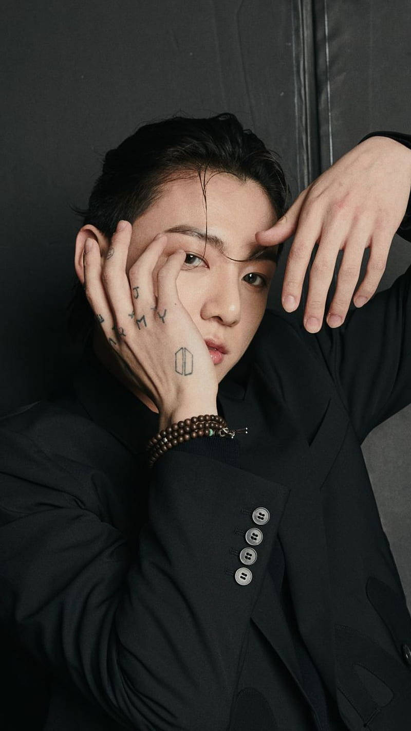 Jungkook, black suit, hands near his face, HD Phone Wallpaper