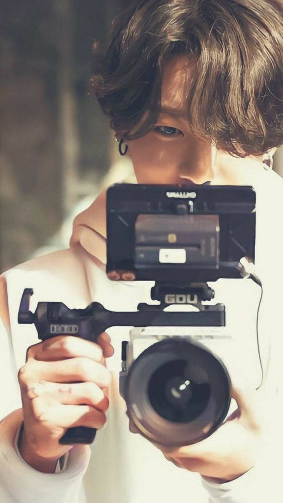 Jungkook, wavy brown hair, camera, SD Phone Wallpaper
