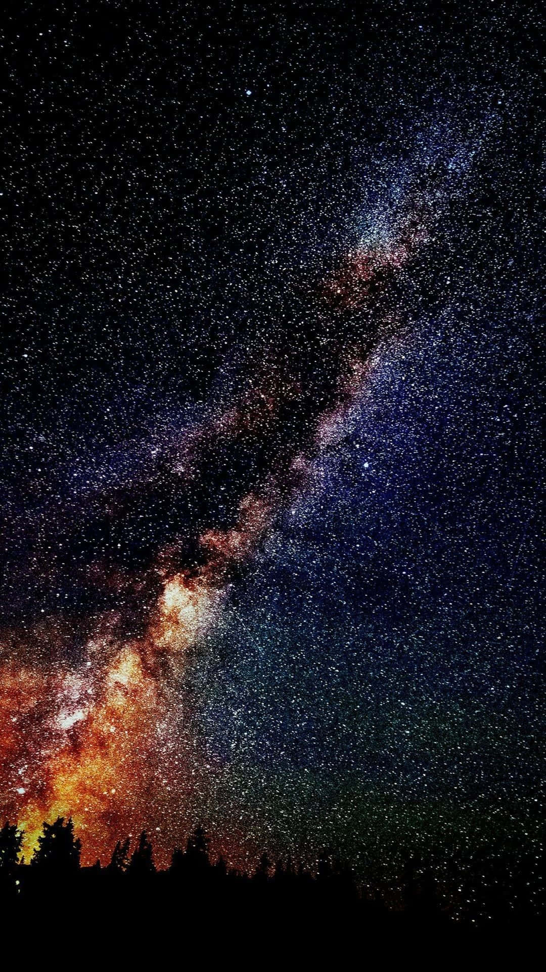 Milky Way galaxy, orange and blue hues, dark forest silhouette, Full HD Phone Wallpaper