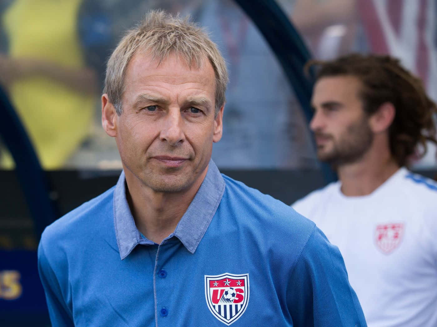 Jurgen Klinsmann, blue US soccer polo shirt, stadium background, HD Desktop Wallpaper