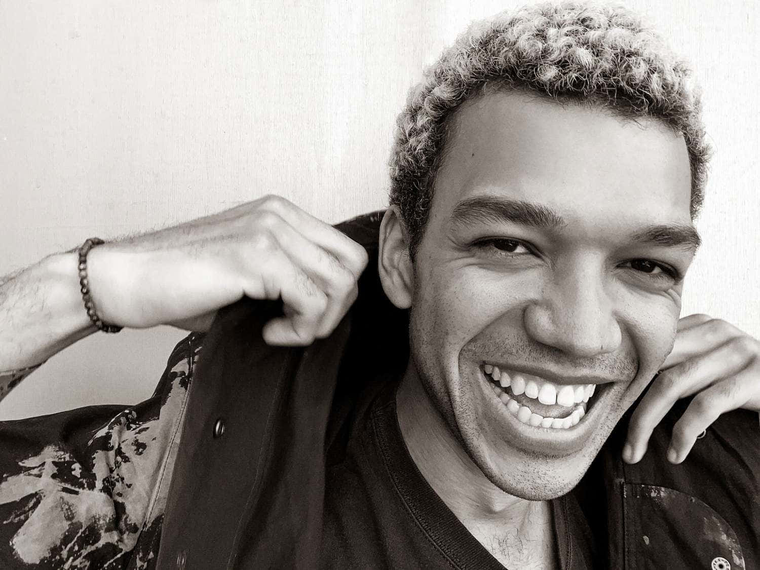 Justice Smith, black and white portrait, smiling man, HD Desktop Wallpaper