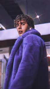 Justin Bieber, plush purple coat, dramatic studio lighting, SD Phone Wallpaper
