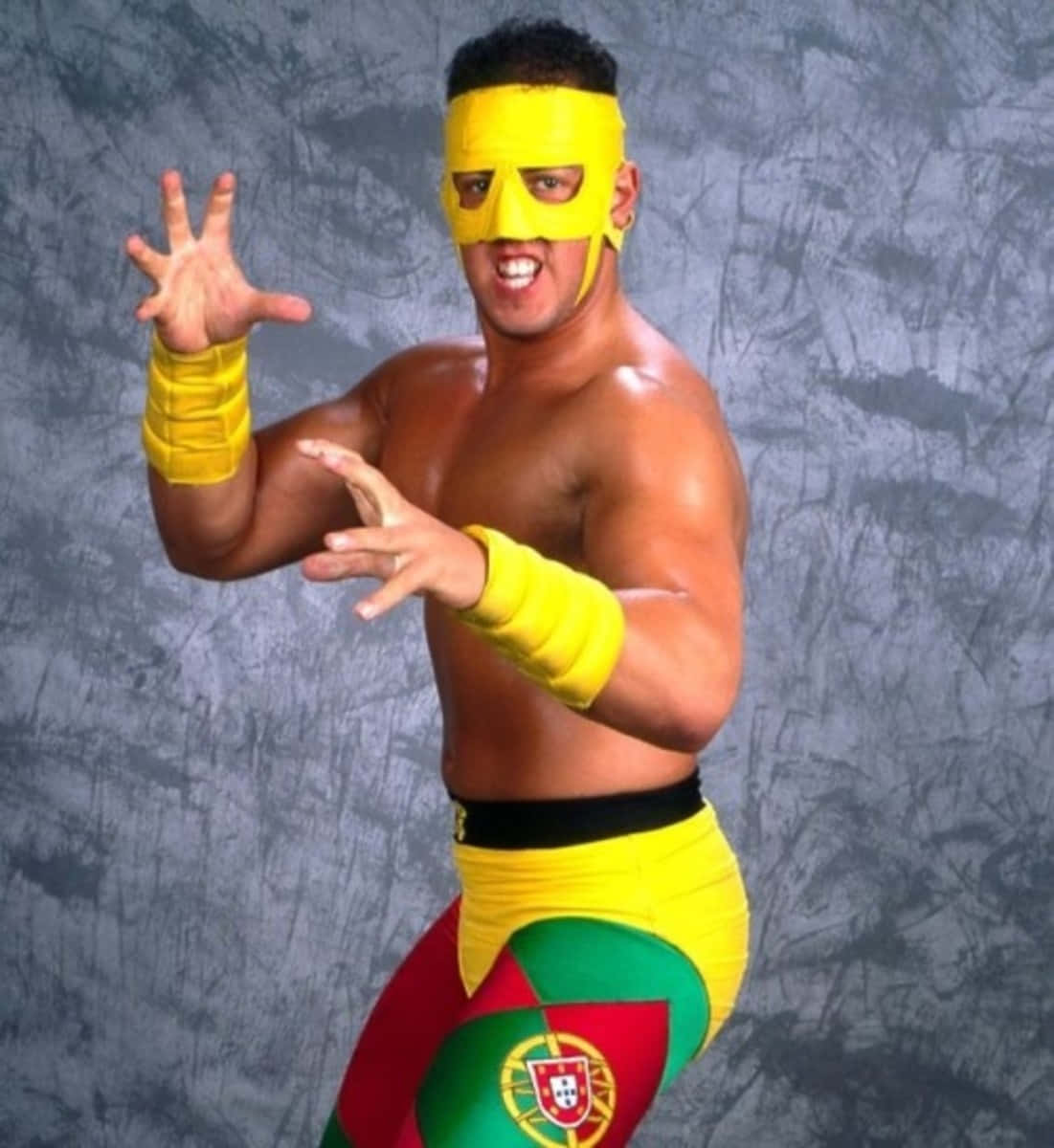 Justin Credible, bright yellow mask, trunks featuring the Portuguese flag, SD Phone Wallpaper