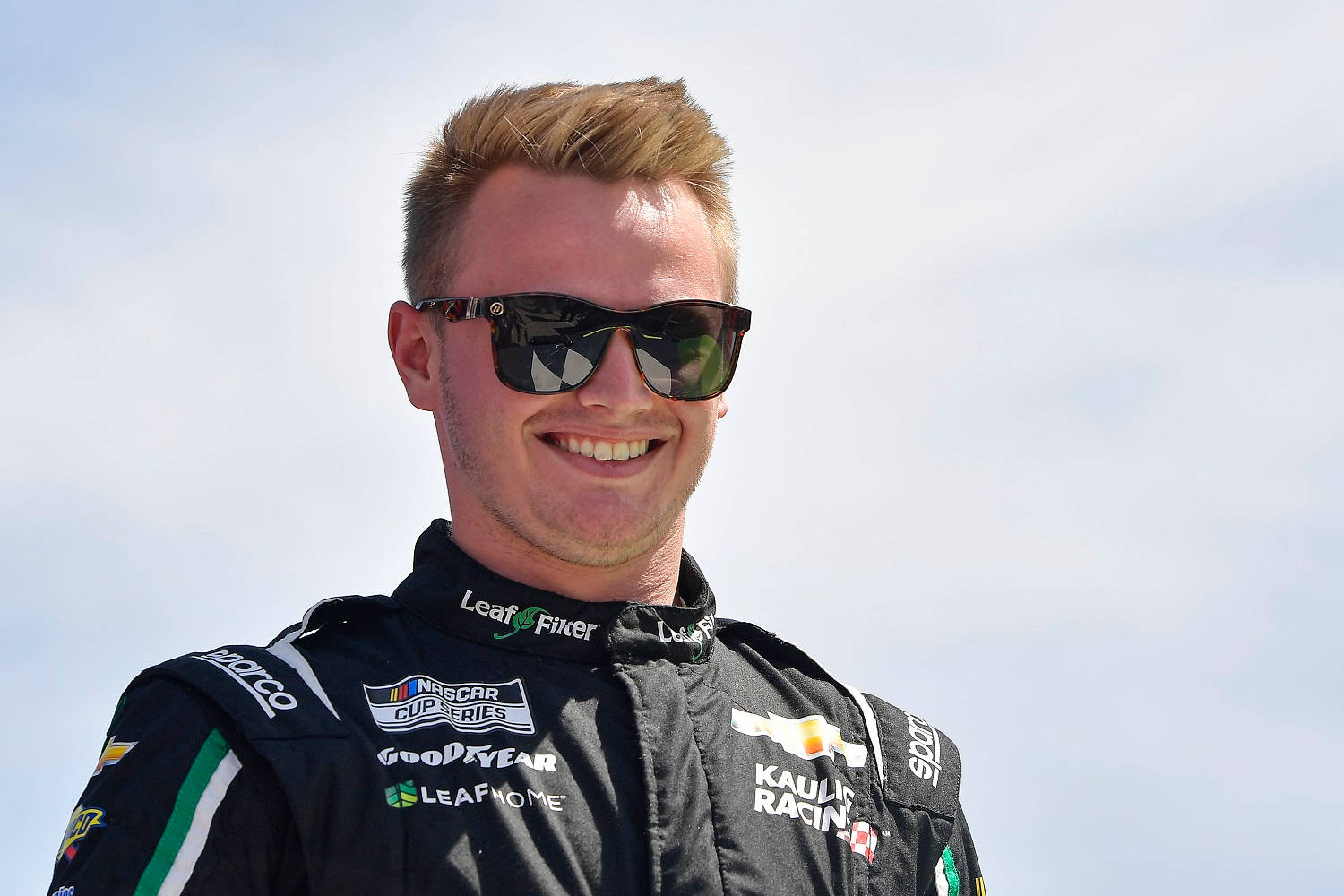Justin Haley, black racing suit, sponsor logos, HD Desktop Wallpaper