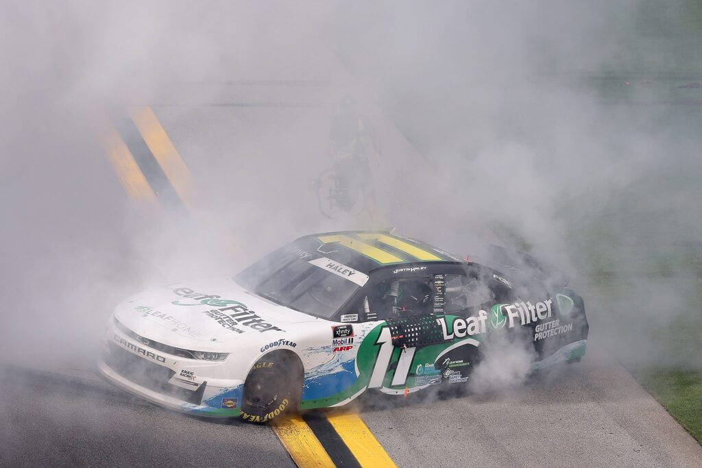 Justin Haley, green and white race car, smokes heavily, SD Desktop Wallpaper