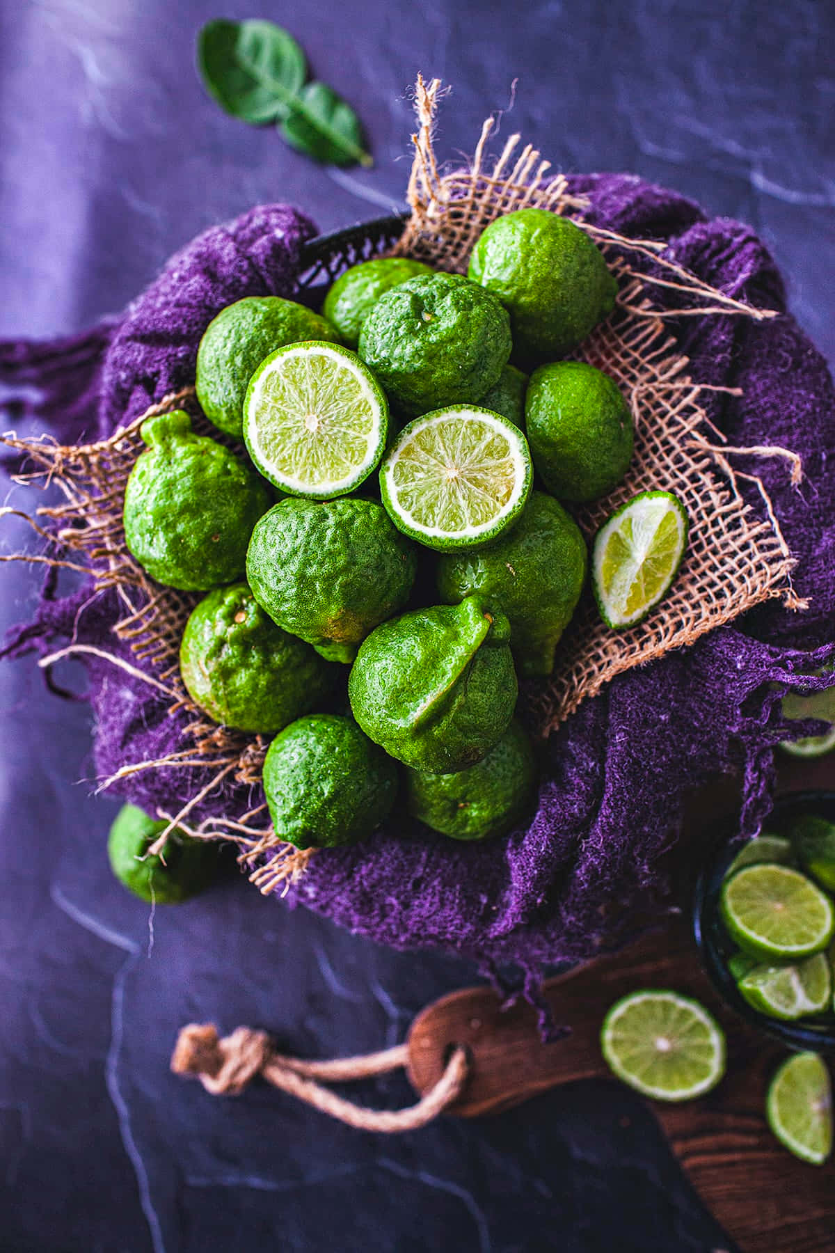 round kaffir lime, green limes, purple fabric, HD Phone Wallpaper