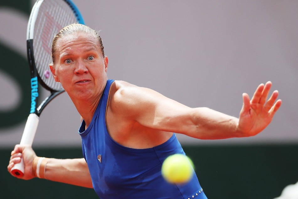 Kaia Kanepi, blue top, yellow ball, SD Desktop Wallpaper