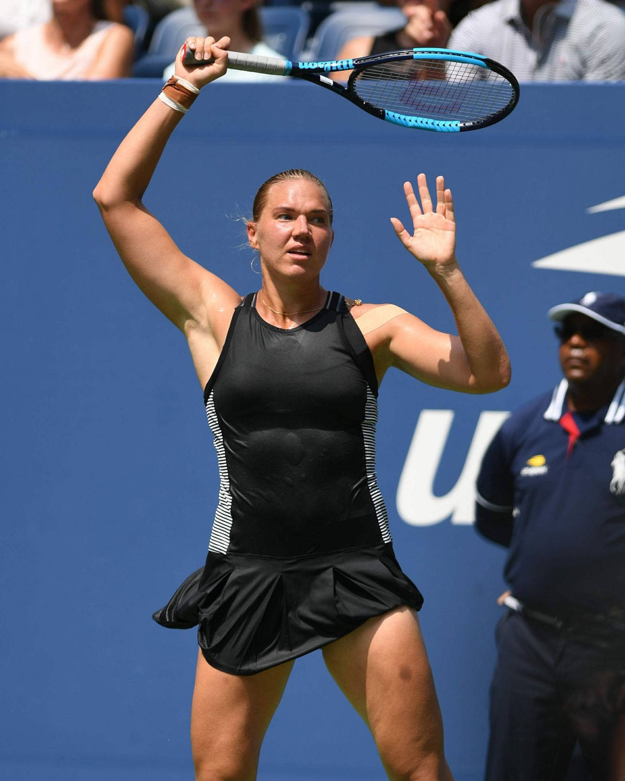 Kaia Kanepi, black athletic gear, blue court backdrop, HD Phone Wallpaper