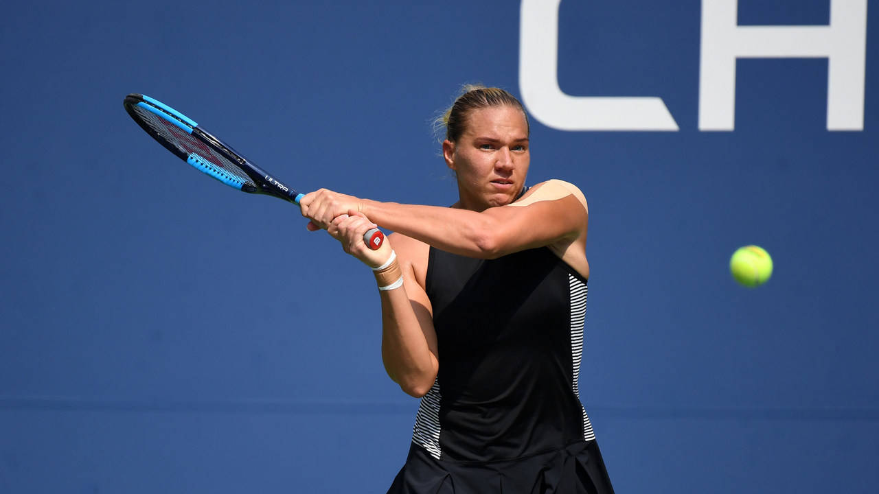 Kaia Kanepi, black athletic gear, blue racket, HD Desktop Wallpaper