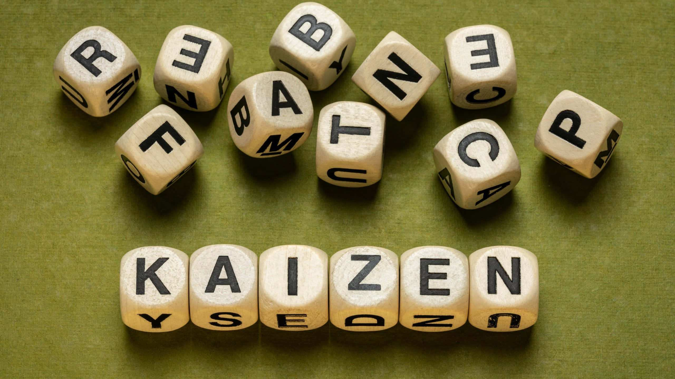 Kaizen, wooden blocks, white lettered dice, 2K Desktop Wallpaper