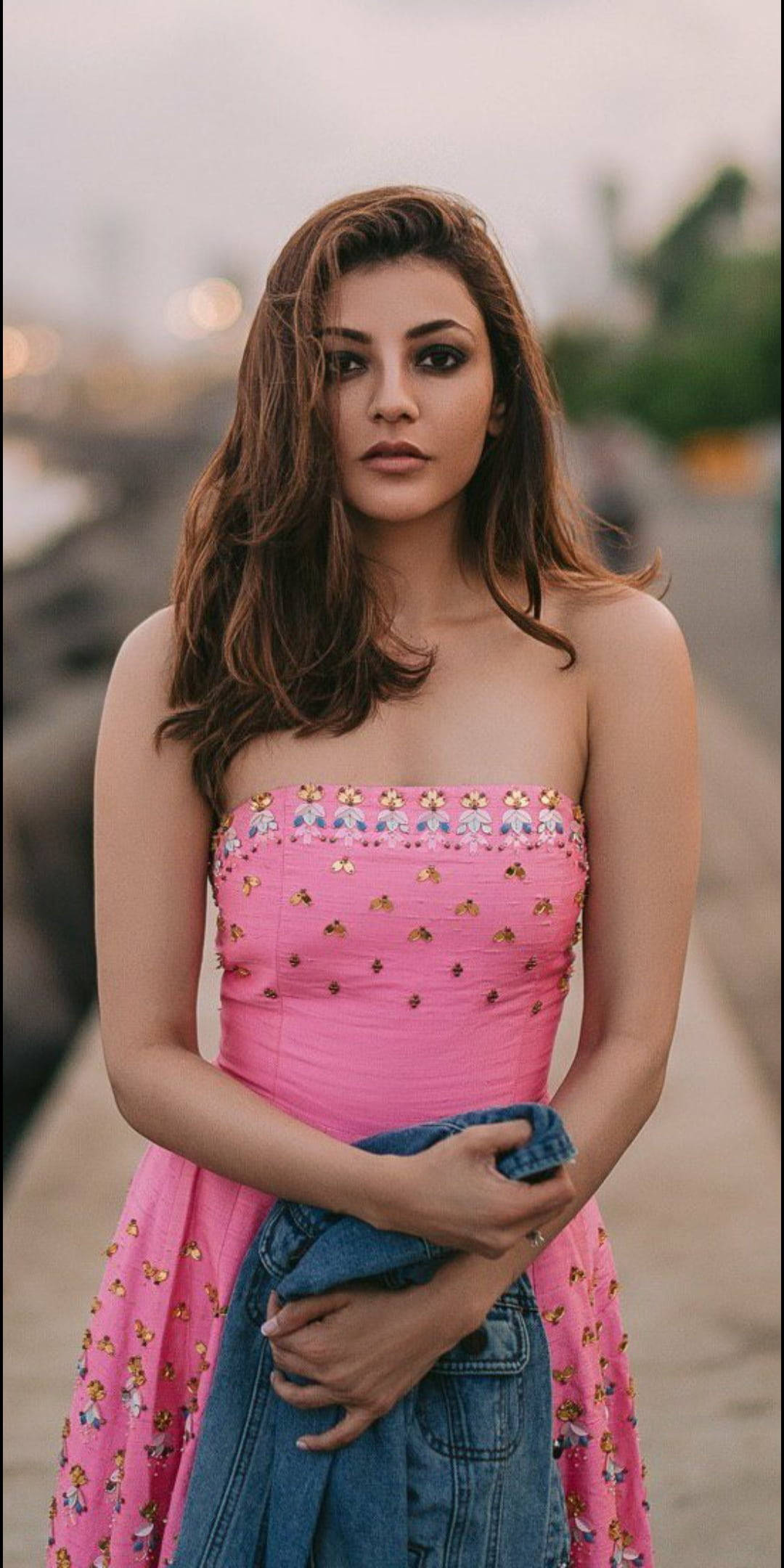 Kajal Agarwal, vibrant pink floral dress, denim jeans, Full HD Phone Wallpaper