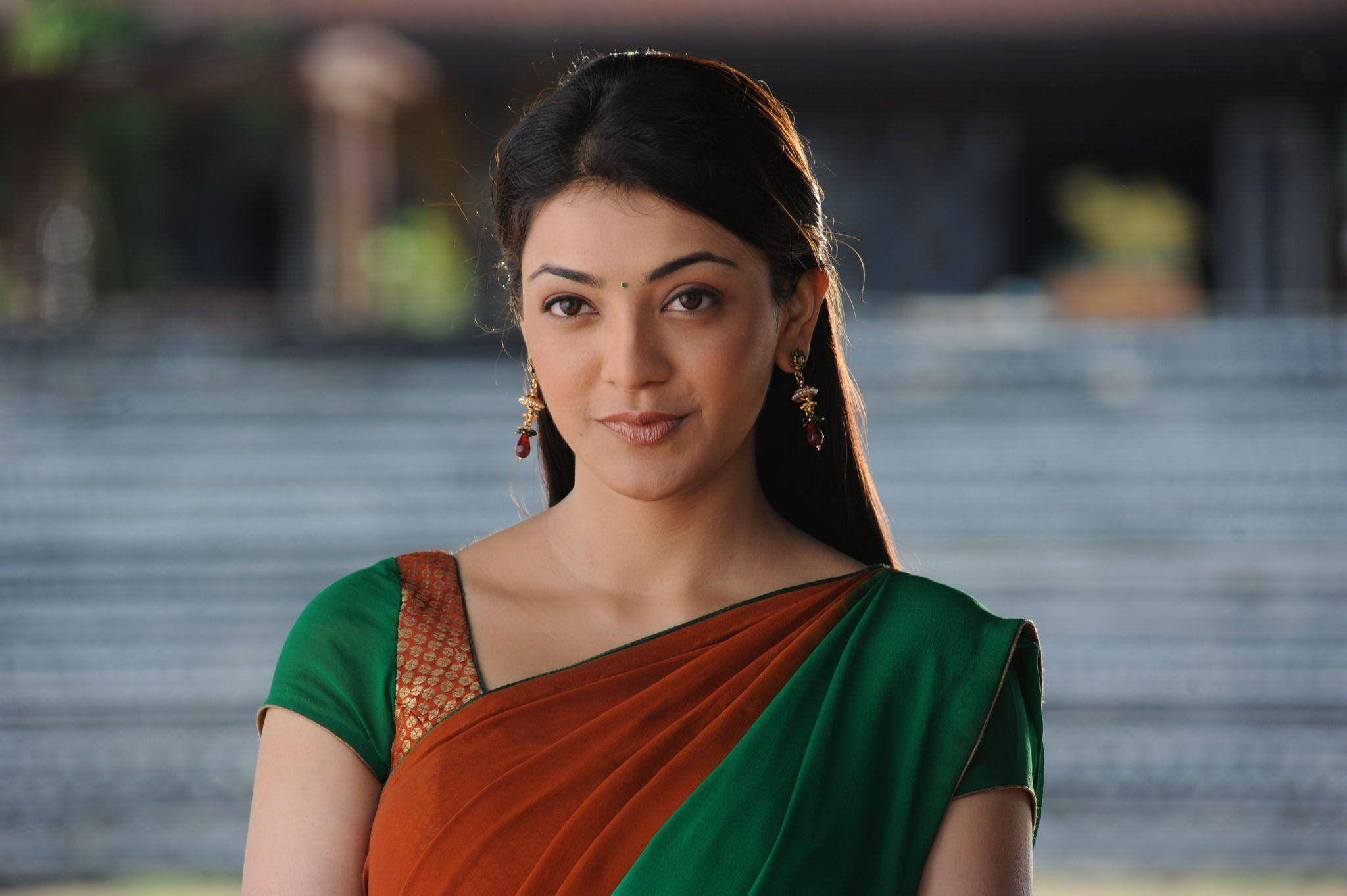 Kajal Agarwal, green and orange sari, serene expression, Full HD Desktop Wallpaper