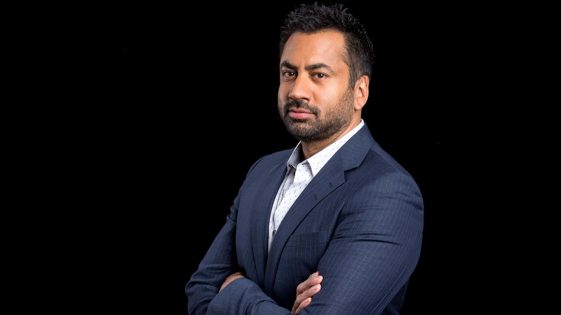 Kal Penn, dark pinstripe suit, solid black background, Full HD Desktop Wallpaper