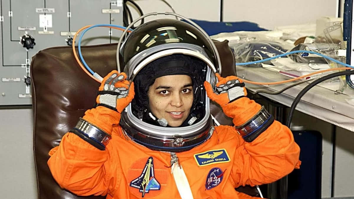 Kalpana Chawla, orange spacesuit, helmet, SD Desktop Wallpaper