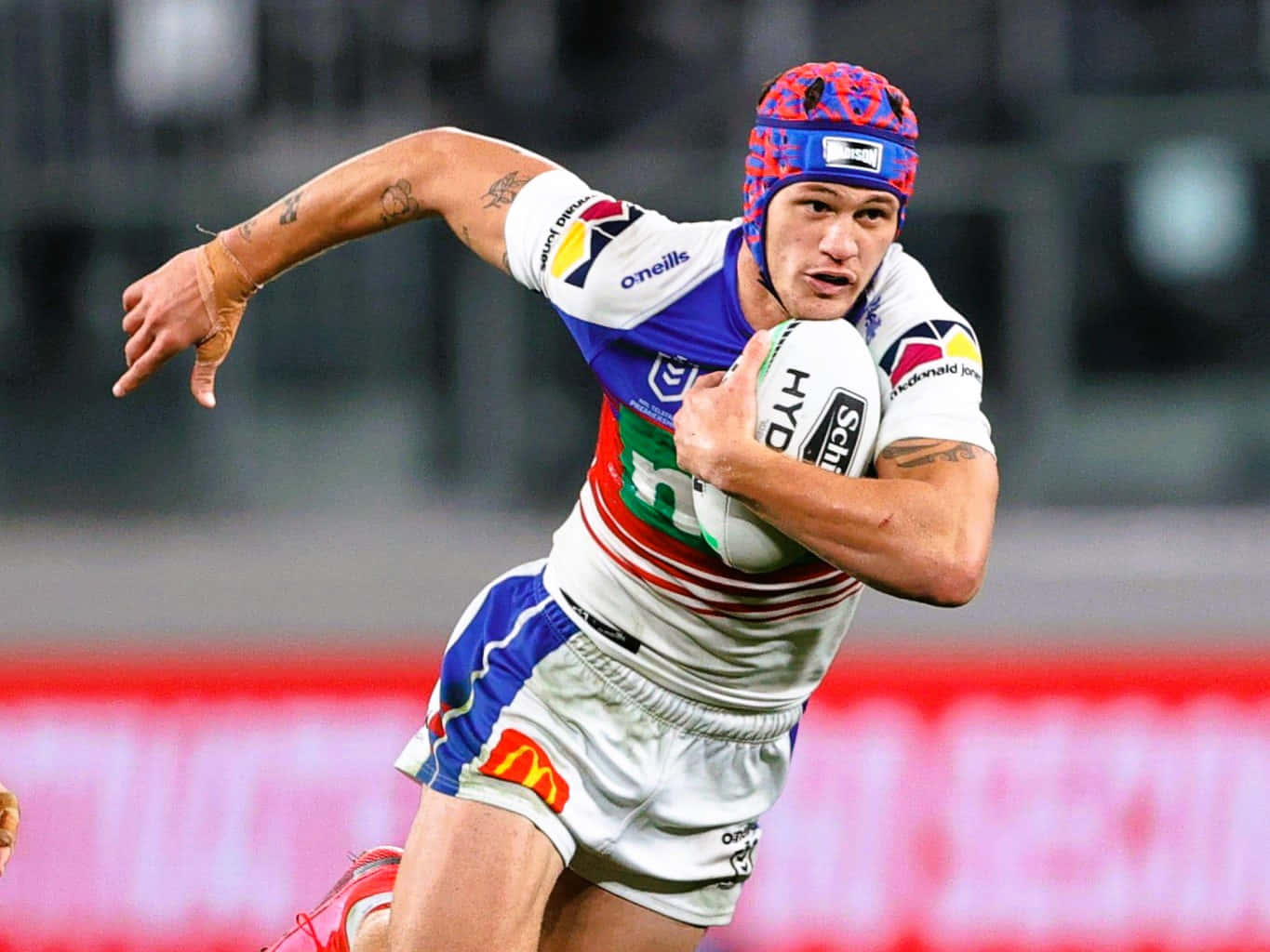 Kalyn Ponga, blue white and red uniform, nighttime game, HD Desktop Wallpaper