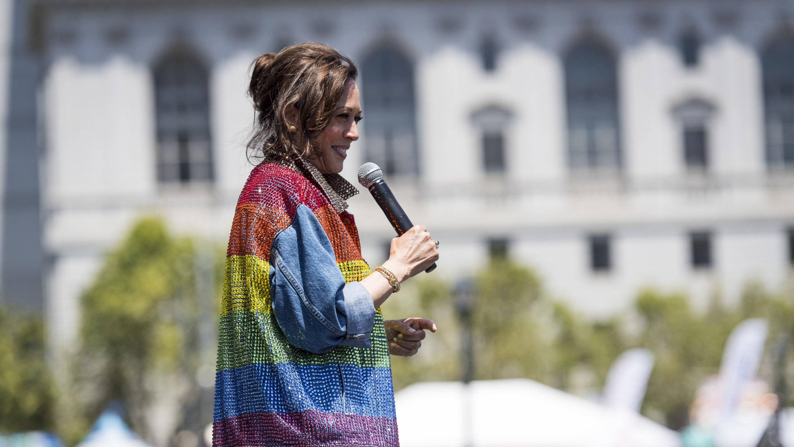 Kamala Harris, rainbow jacket, vibrant rainbow beaded shawl, 2K Desktop Wallpaper