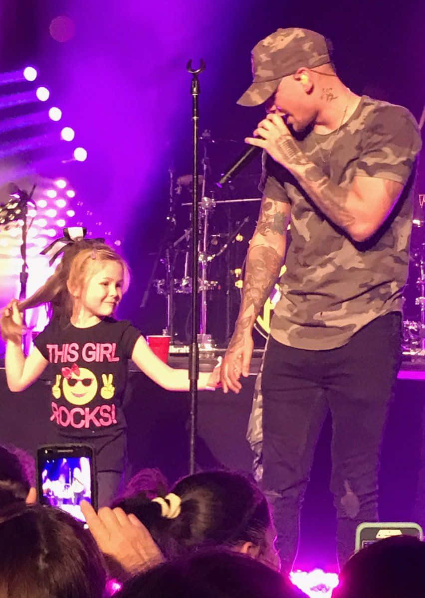 Kane Brown, camouflage outfit, purple stage lights, SD Phone Wallpaper