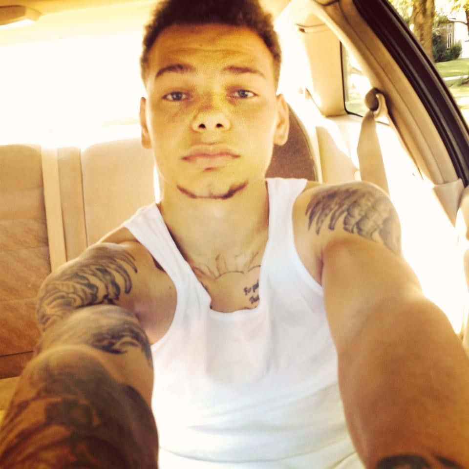 Kane Brown, sunlit car, white tank top, SD Desktop Wallpaper