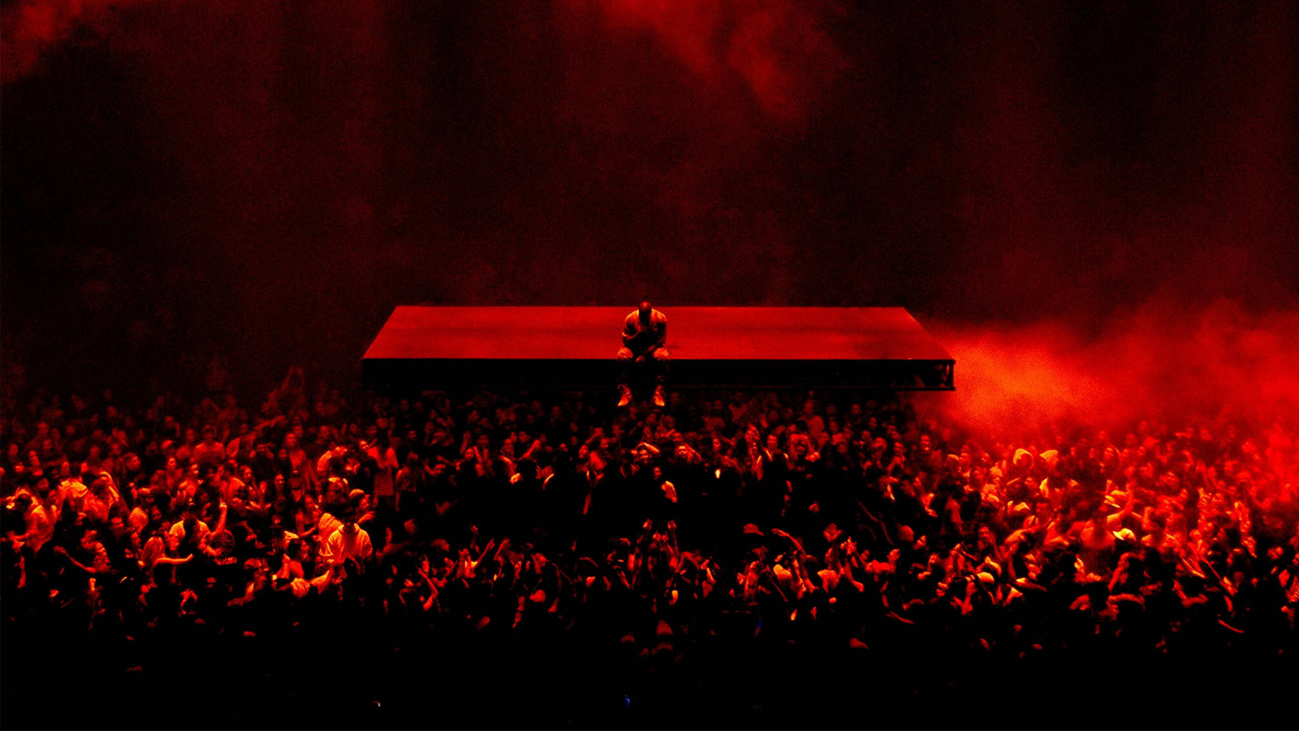 Kanye West Saint Pablo, red light, silhouetted performer, 2K Desktop Wallpaper