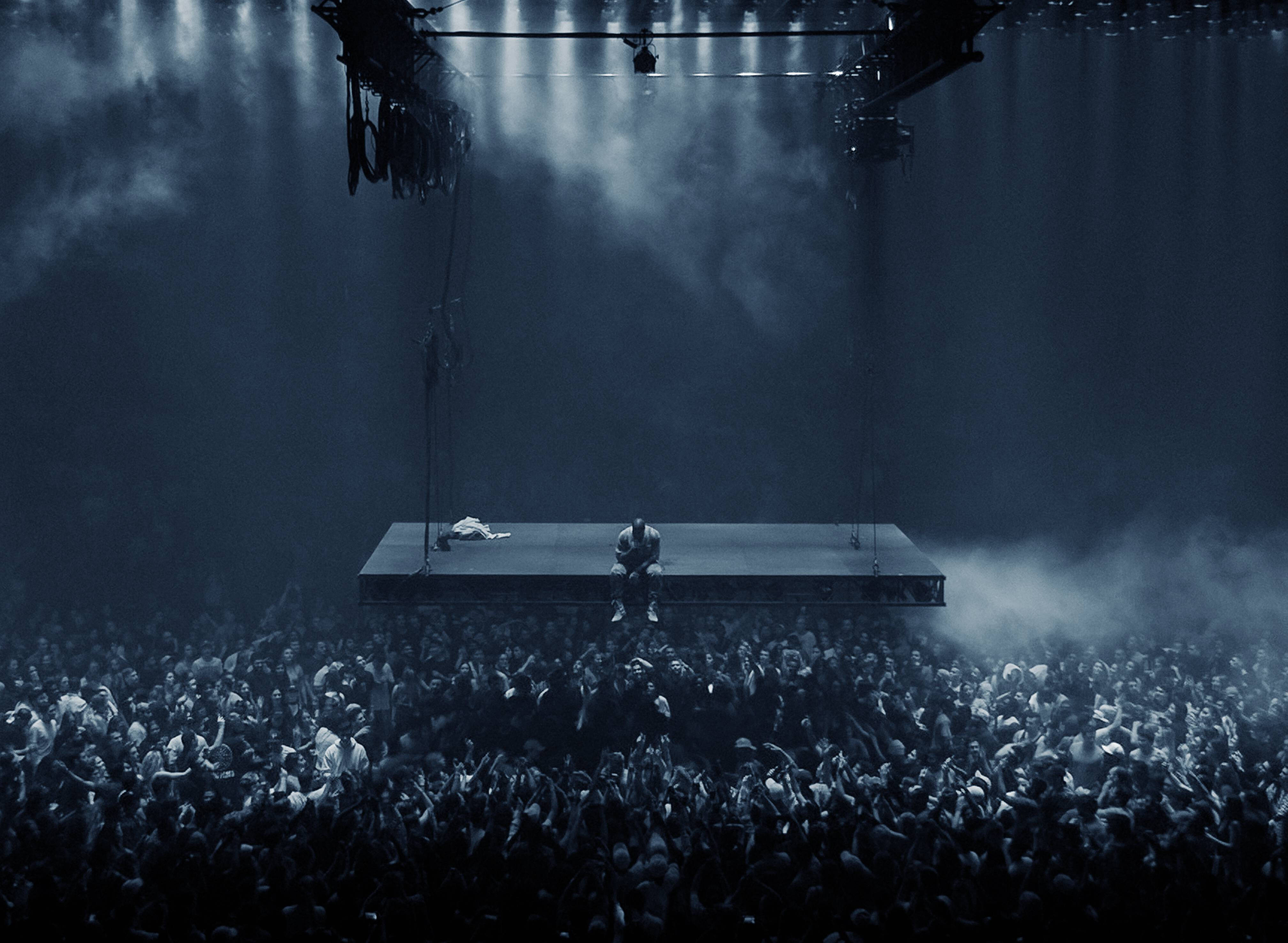 Kanye West Saint Pablo, suspended stage, dimly lit concert hall, 4K Desktop Wallpaper