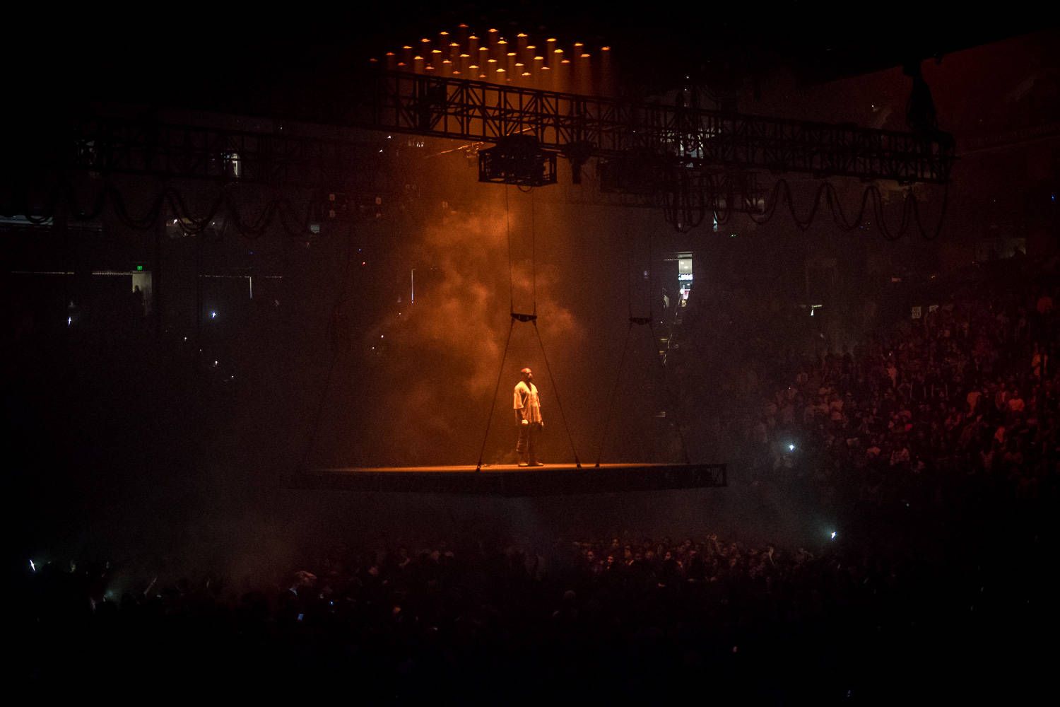 Kanye West Saint Pablo, suspended stage, warm orange light, HD Desktop Wallpaper