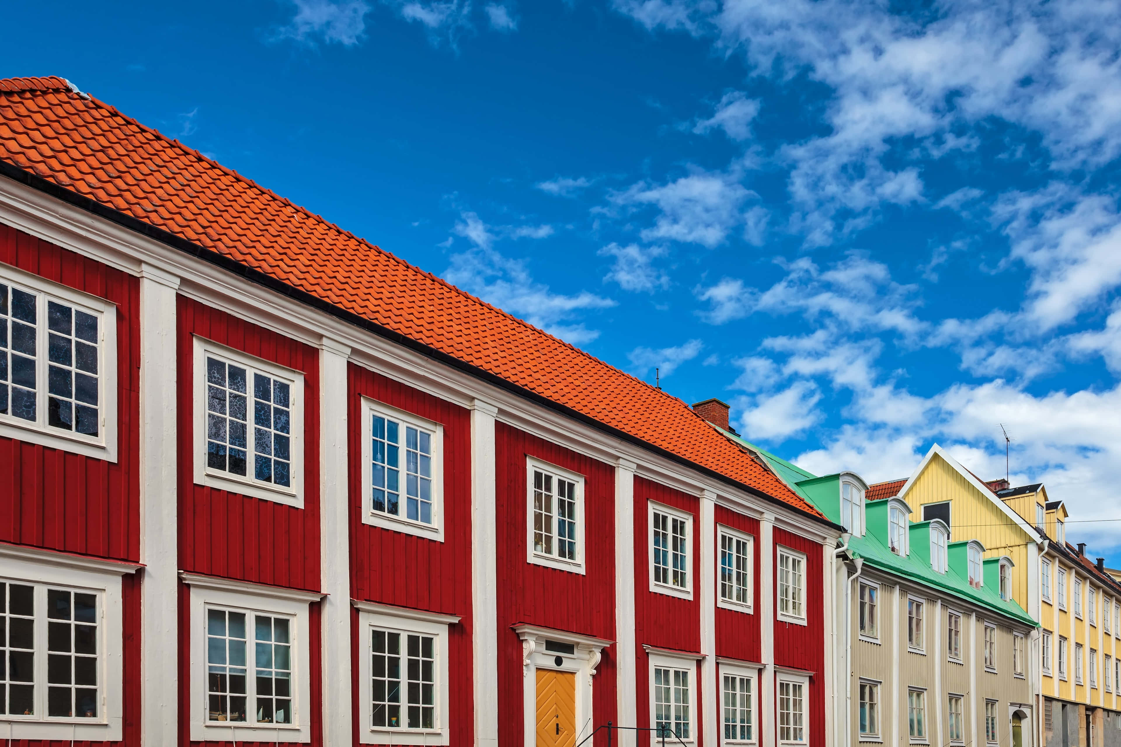 Karlskrona, vibrant red wooden houses, white trim, 4K Desktop Wallpaper