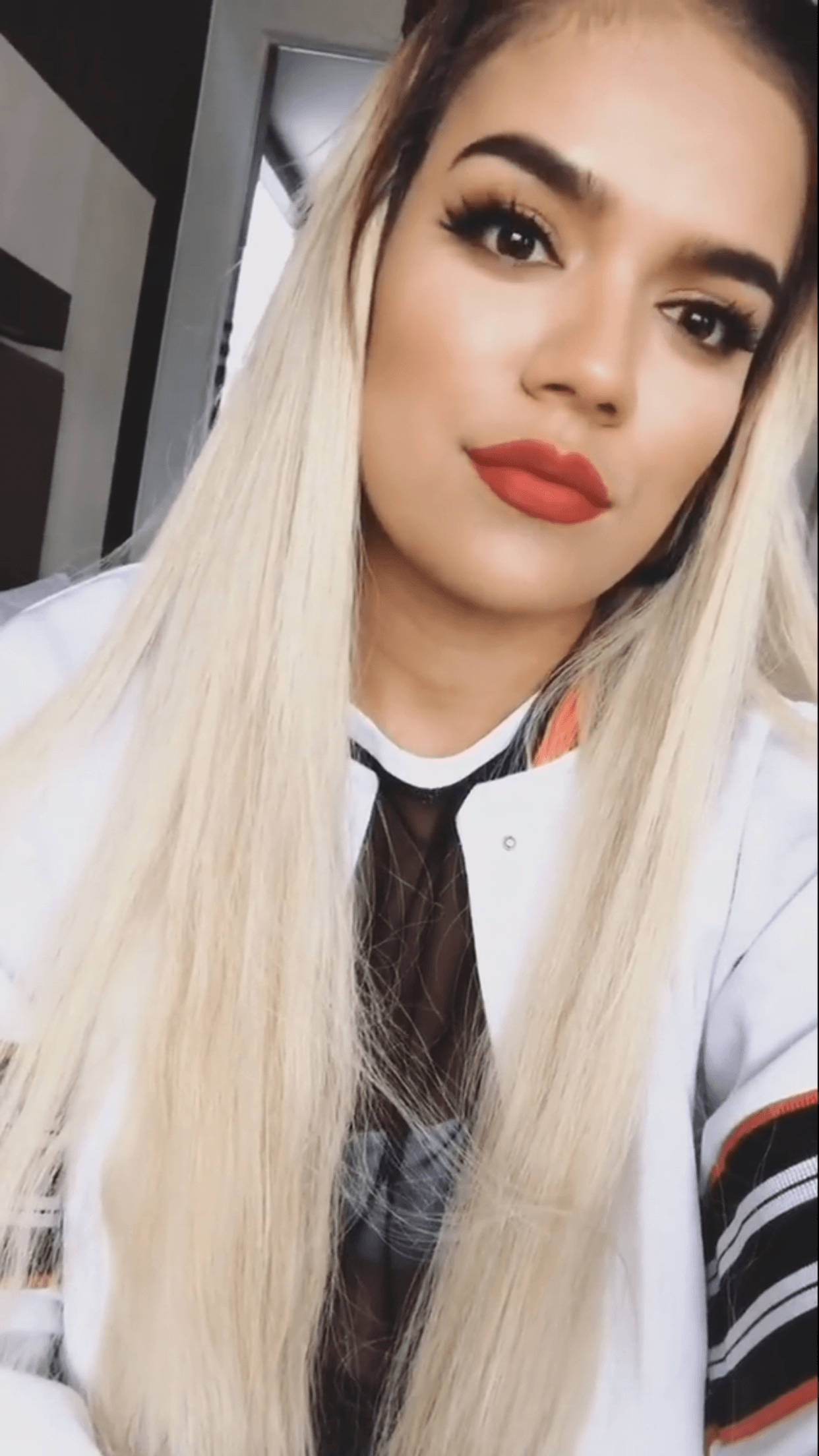 Karol G, platinum blonde hair, bold red lipstick, Full HD Phone Wallpaper