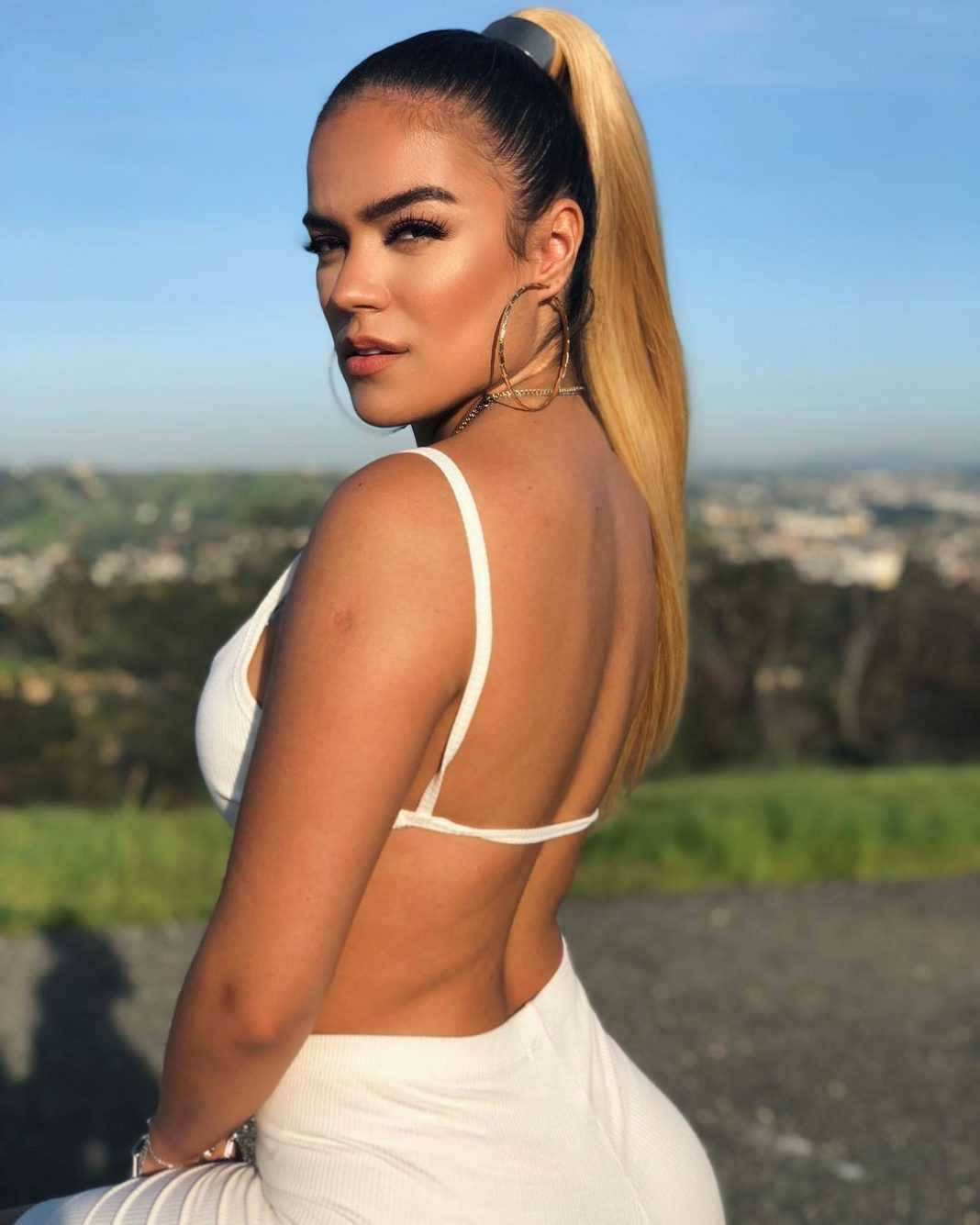 Karol G, backless dress, white outfit, HD Phone Wallpaper