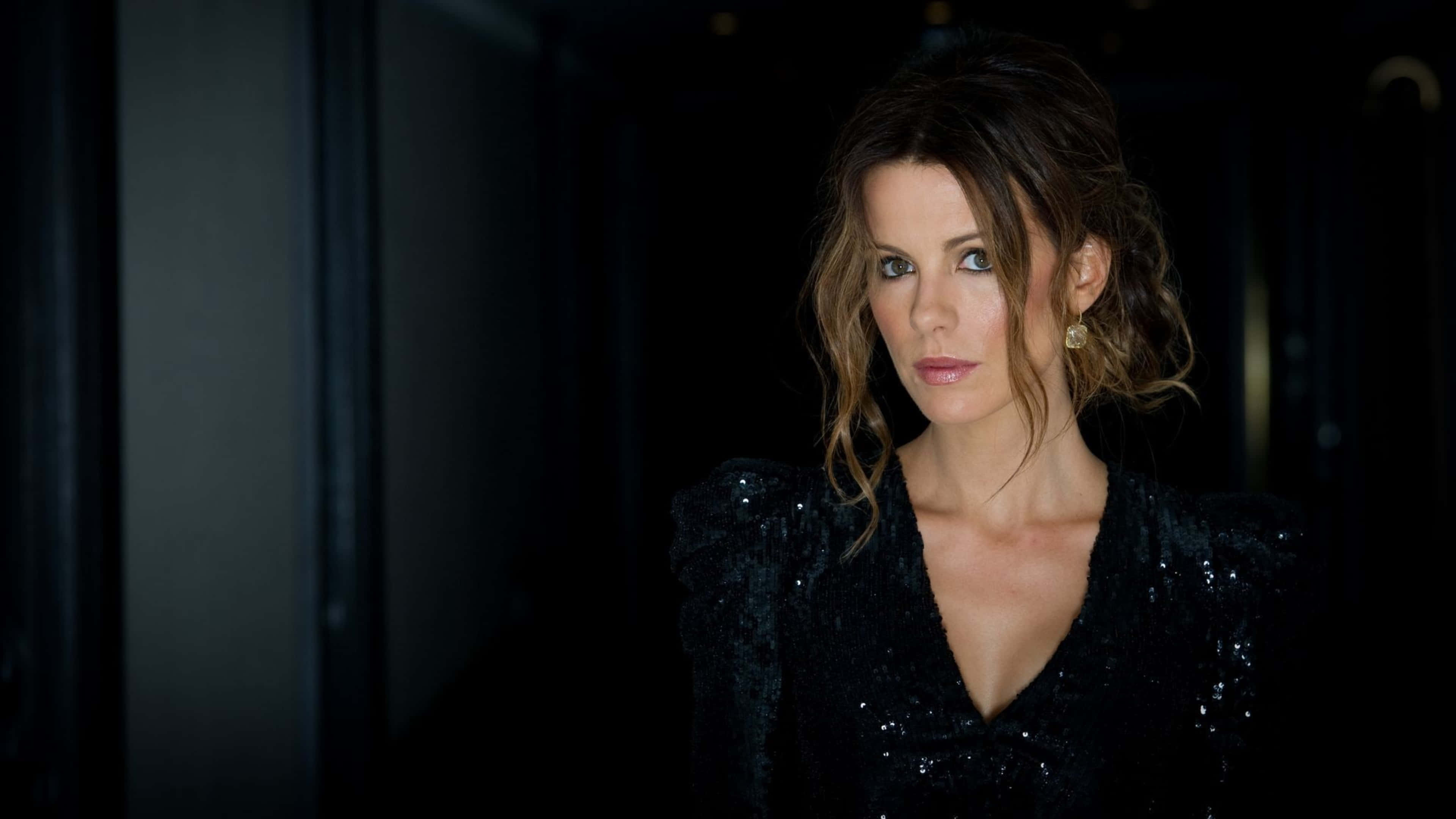 Kate Beckinsale, black sequined dress, dimly lit hallway, 4K Desktop Wallpaper