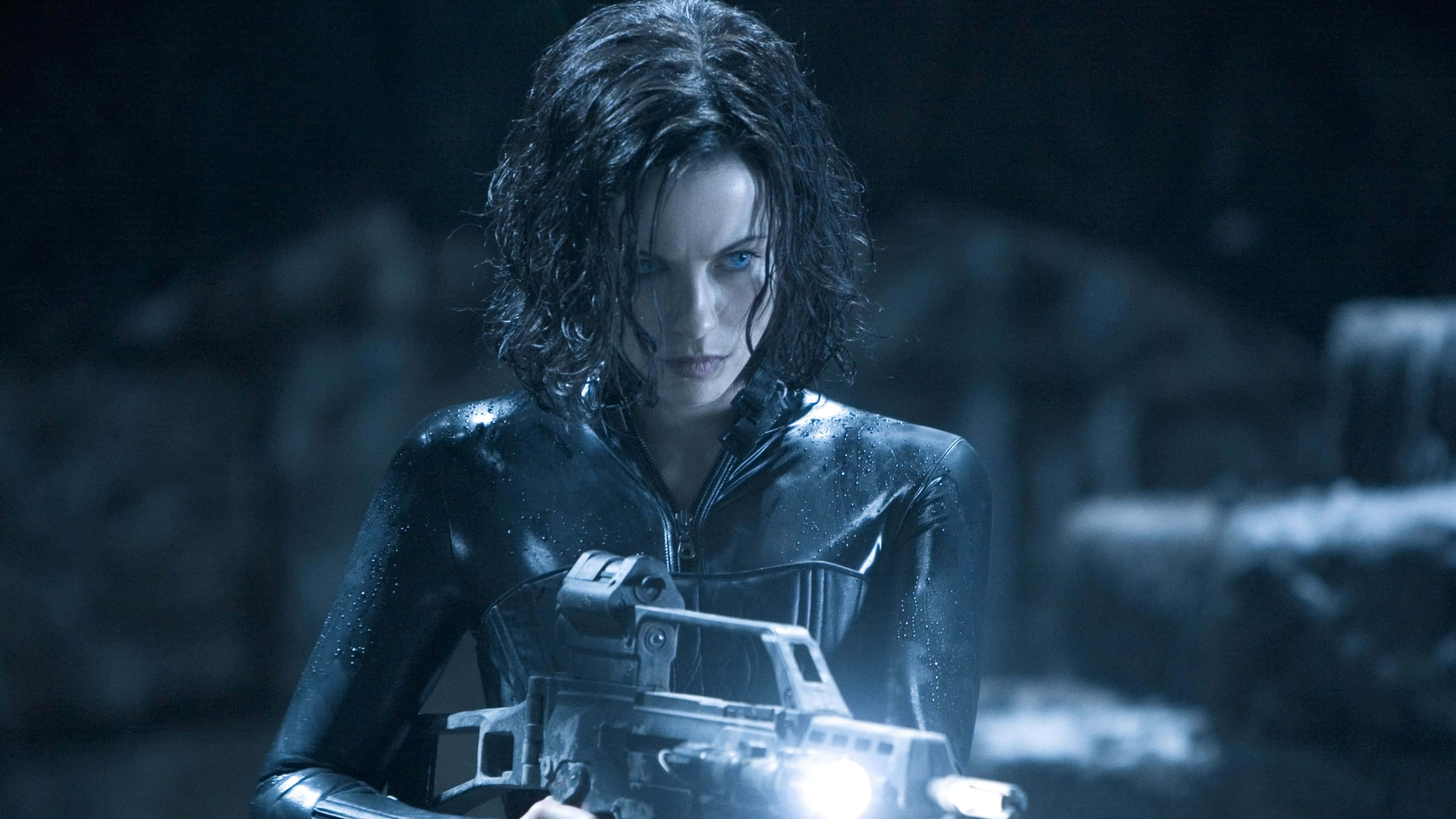 Kate Beckinsale, wet black leather outfit, glowing futuristic weapon, 4K Desktop Wallpaper