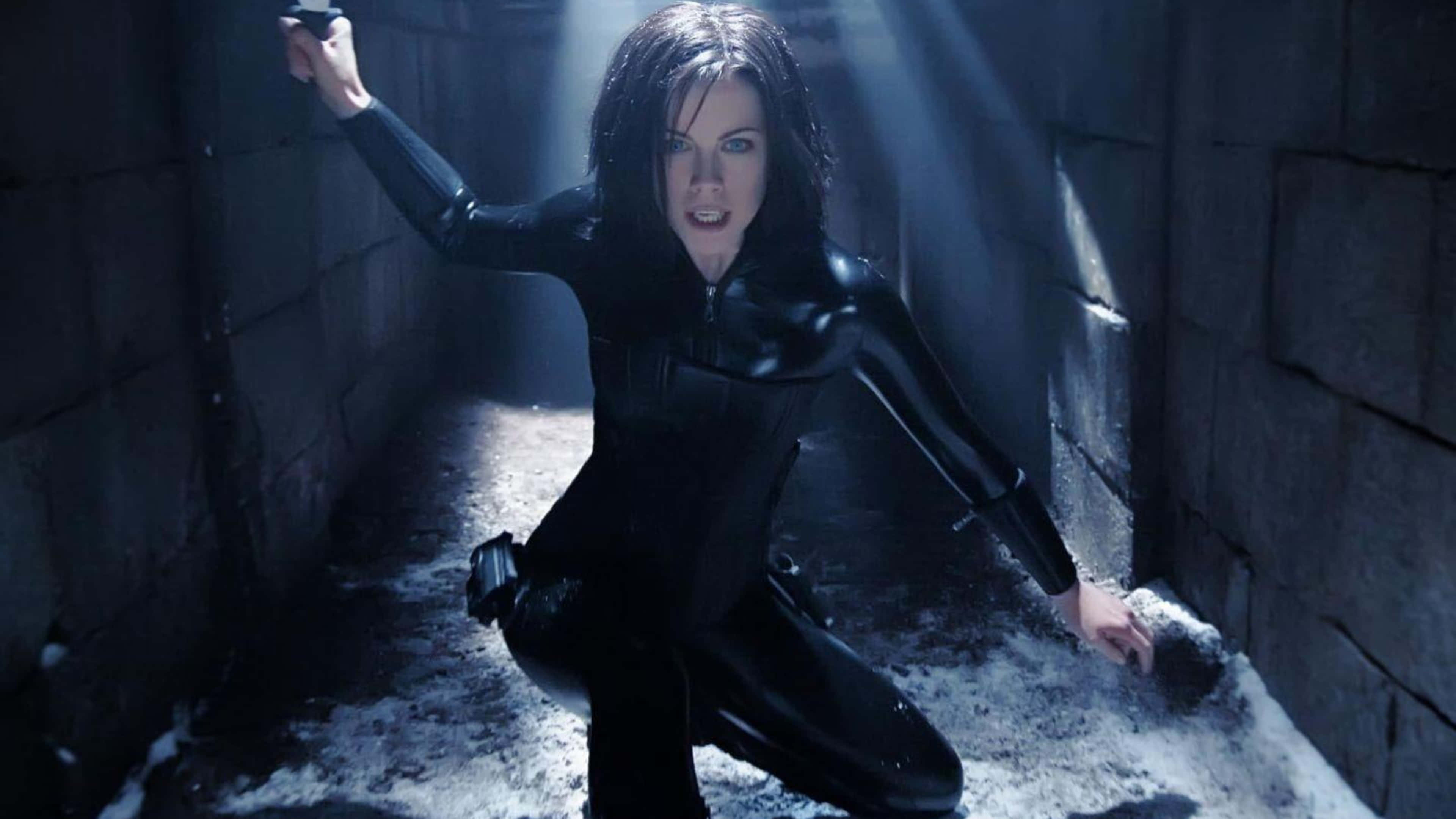 Kate Beckinsale, black leather catsuit, snowy stone alley, 4K Desktop Wallpaper