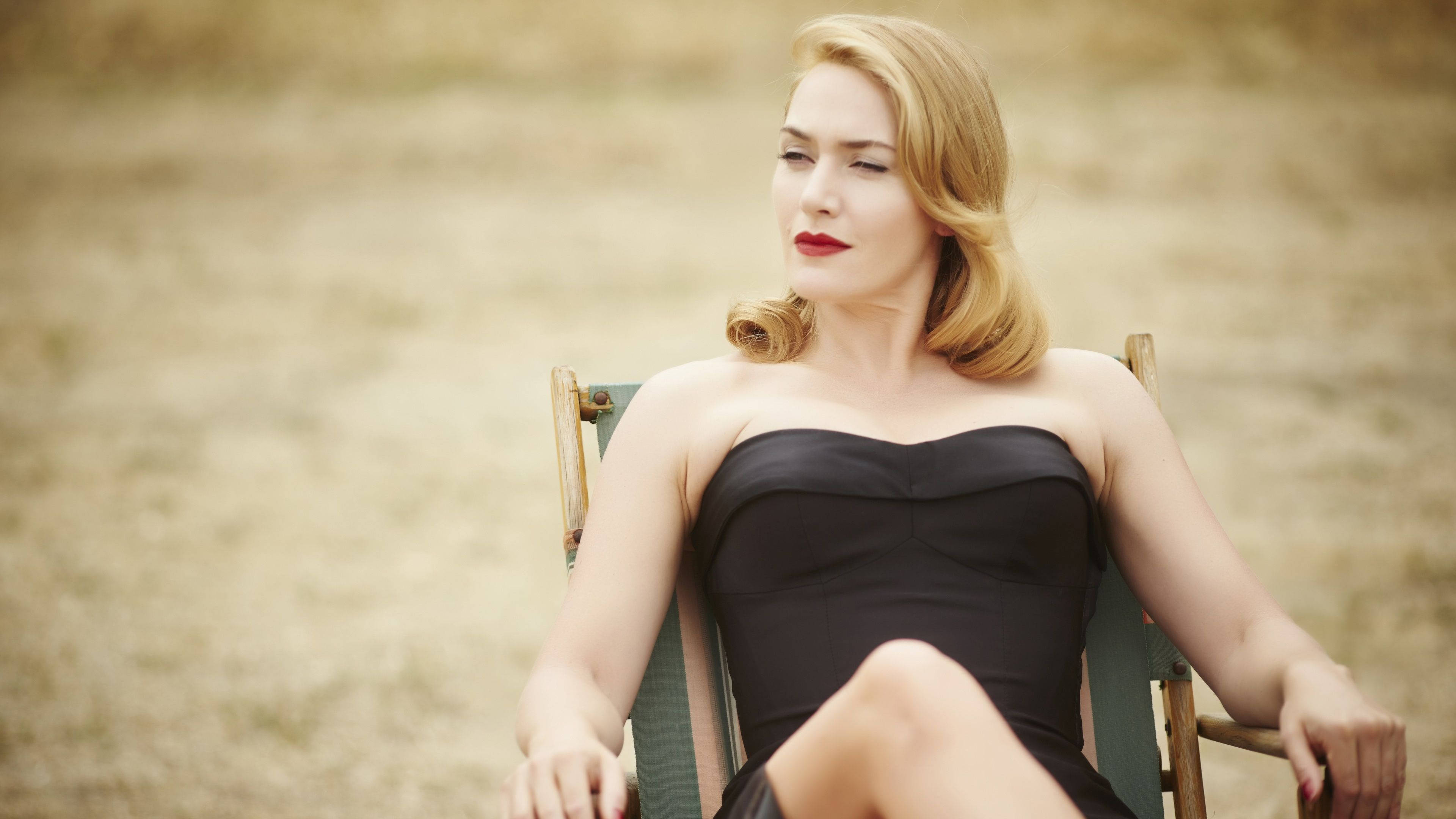 Kate Winslet, black tube dress, wooden chair, 4K Desktop Wallpaper