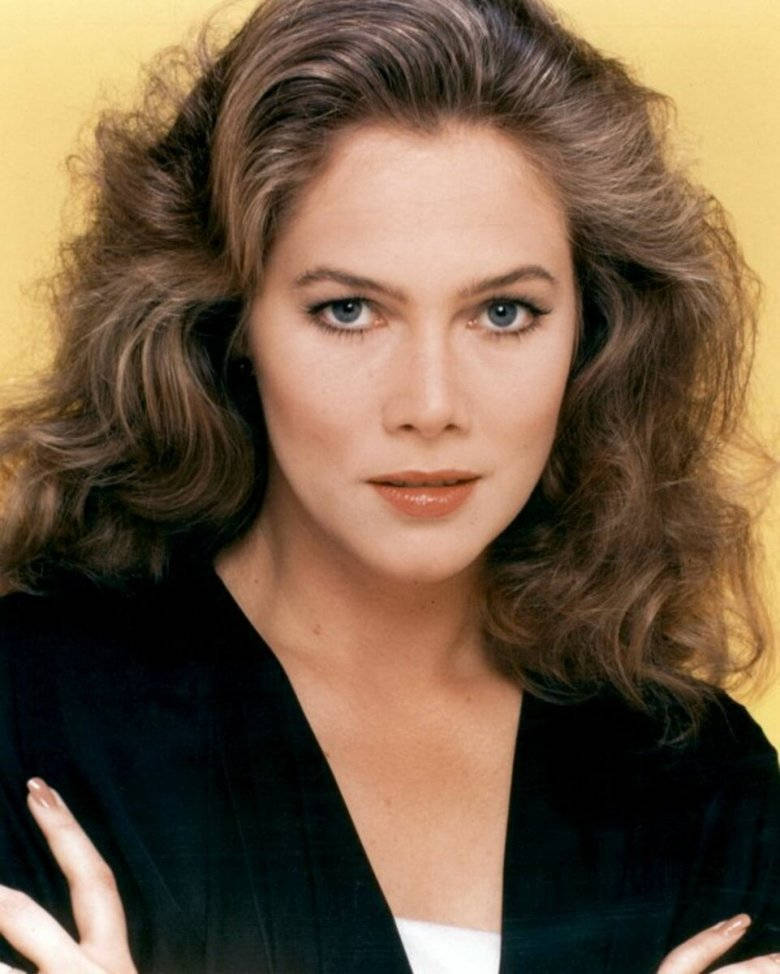 Kathleen Turner, voluminous brown curls, striking blue eyes, SD Phone Wallpaper