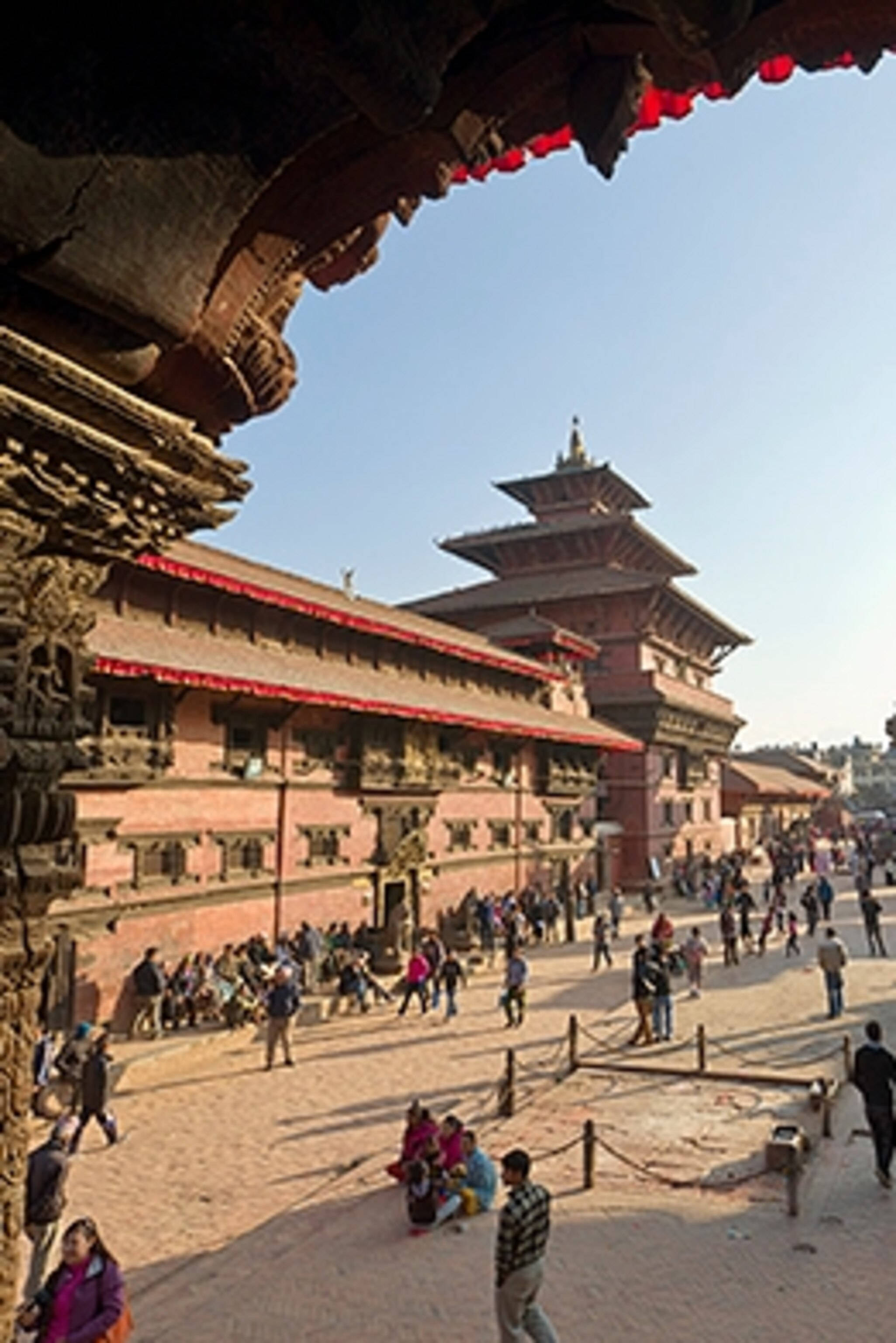 Kathmandu, ornate wooden archway, red-tiled roofs, 2K Phone Wallpaper