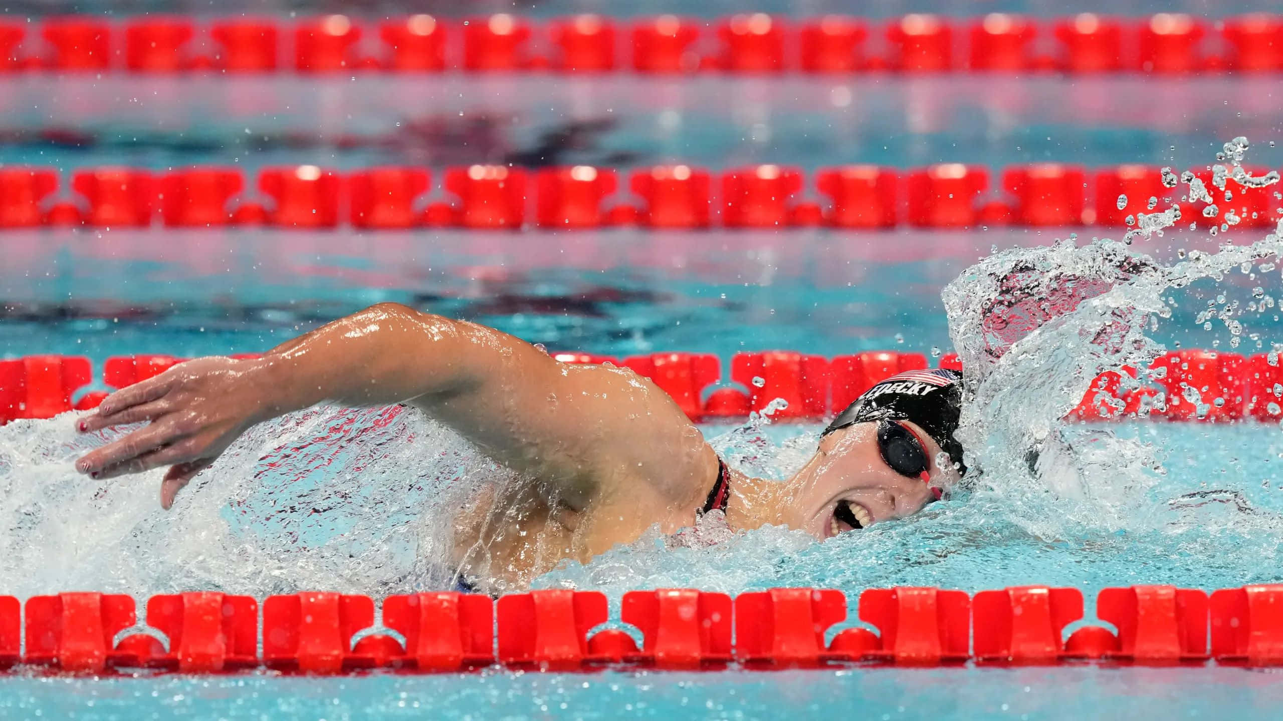 Katie Ledecky, backstroke, turquoise water, 2K Desktop Wallpaper