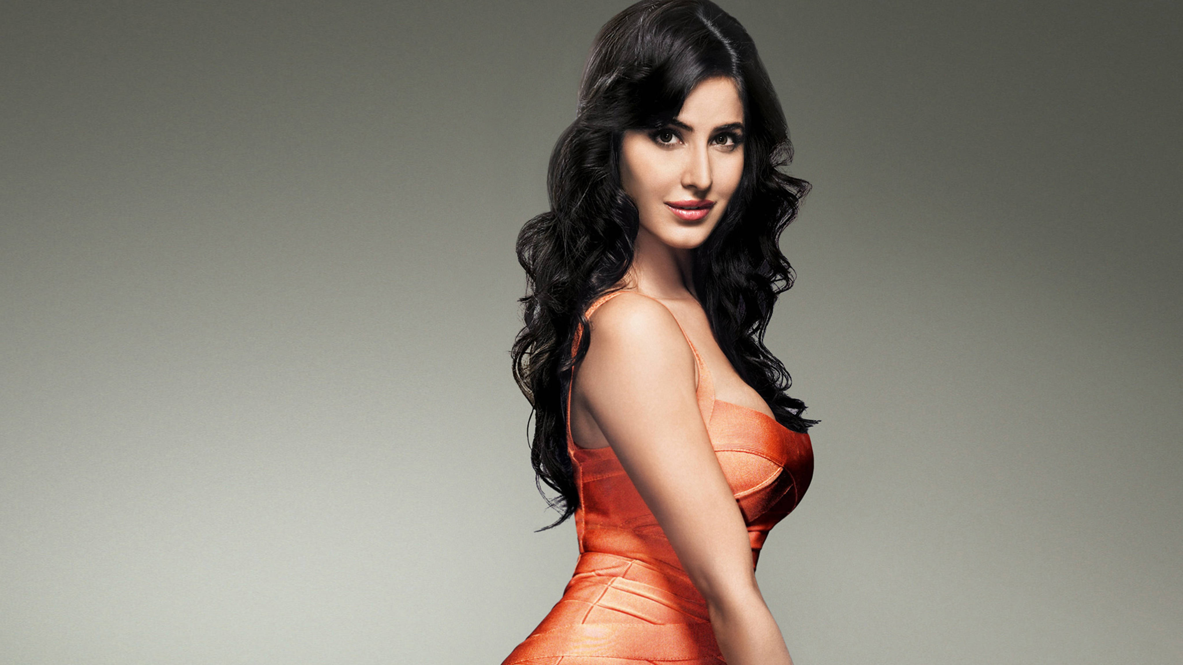 Katrina Kaif, orange dress, long dark wavy hair, 4K Desktop Wallpaper